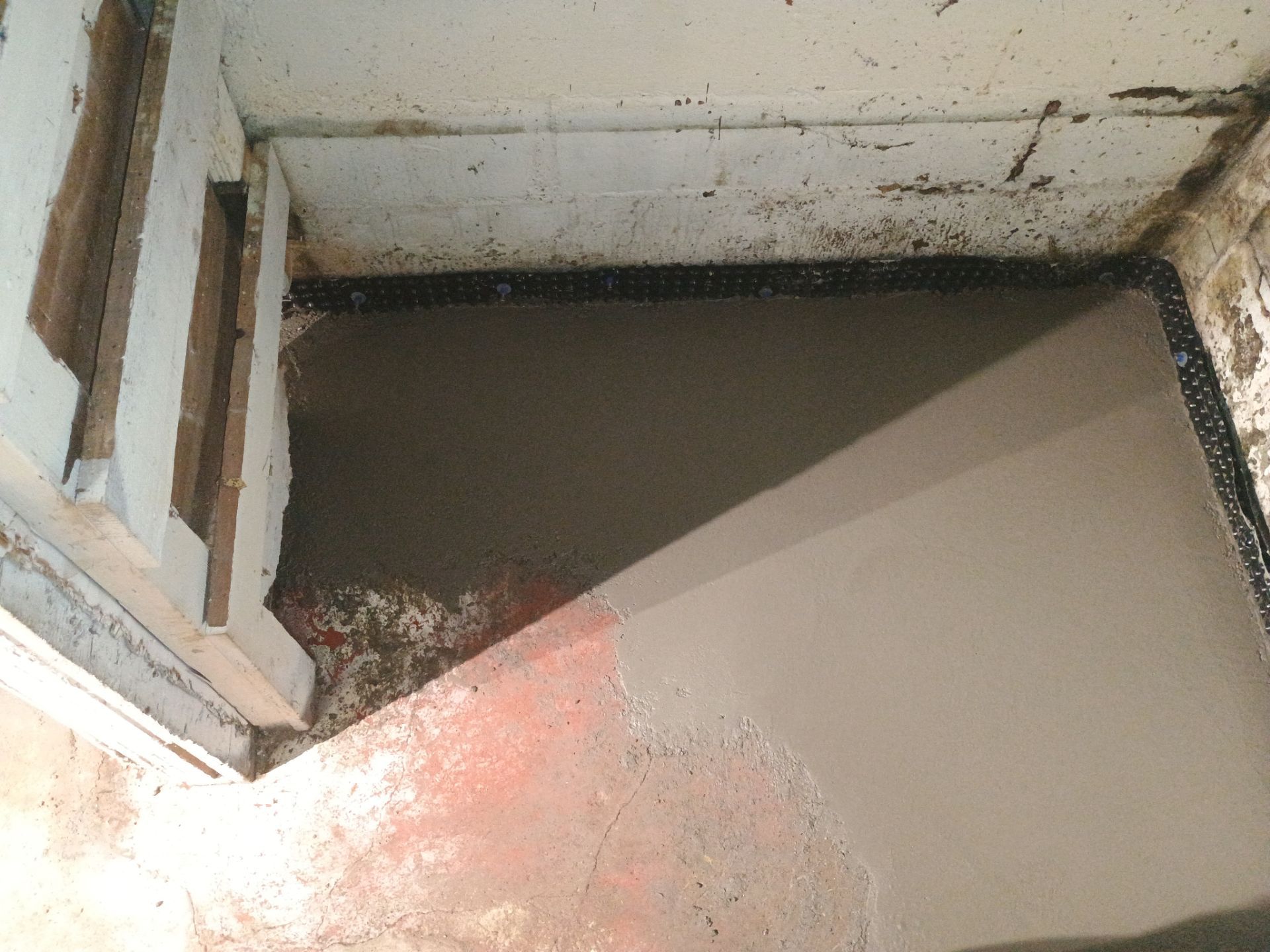 Interior Drain Tile & Sump Pump System in North Minneapolis by Waterproofing Northeast