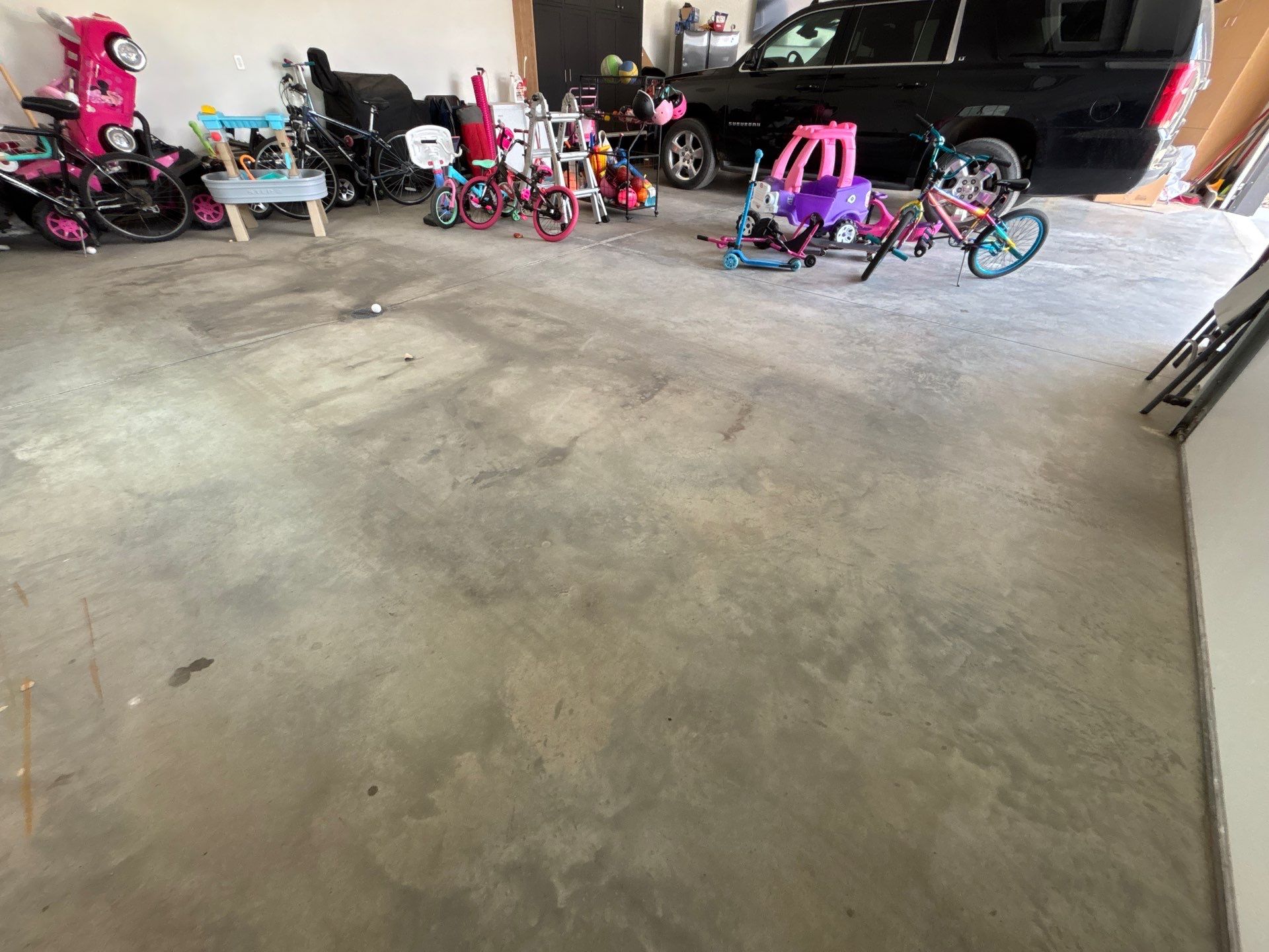 Custom Speckled Concrete Coating for Dell Rapids Garage by Select Painting, Coatings & Garage Cabinets