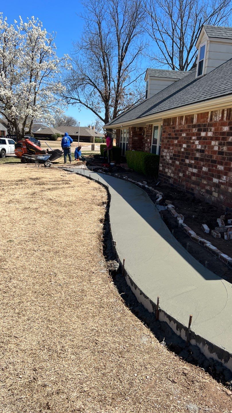 Concrete sidewalk using Concrete by Clays Services Inc