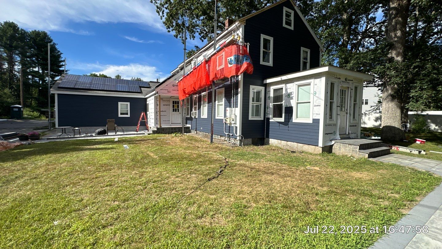 James Hardie Lap Siding Installation in Chelmsford, MA by Mighty Dog Roofing of Greater Middlesex County