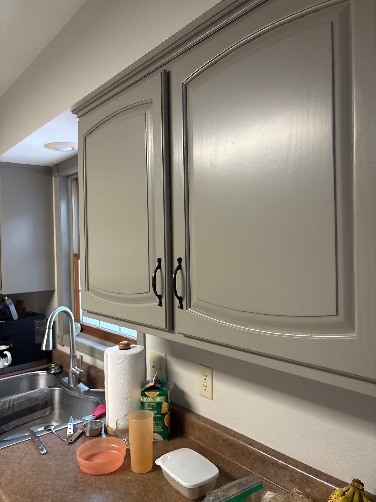 Kitchen Cabinet Painting and Hardware Update in Sioux Falls by Select Painting, Coatings & Garage Cabinets