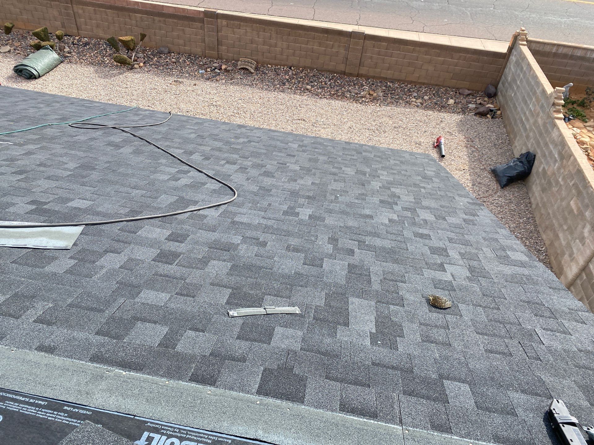 Onyx Black Shingles by Reimagine Roofing