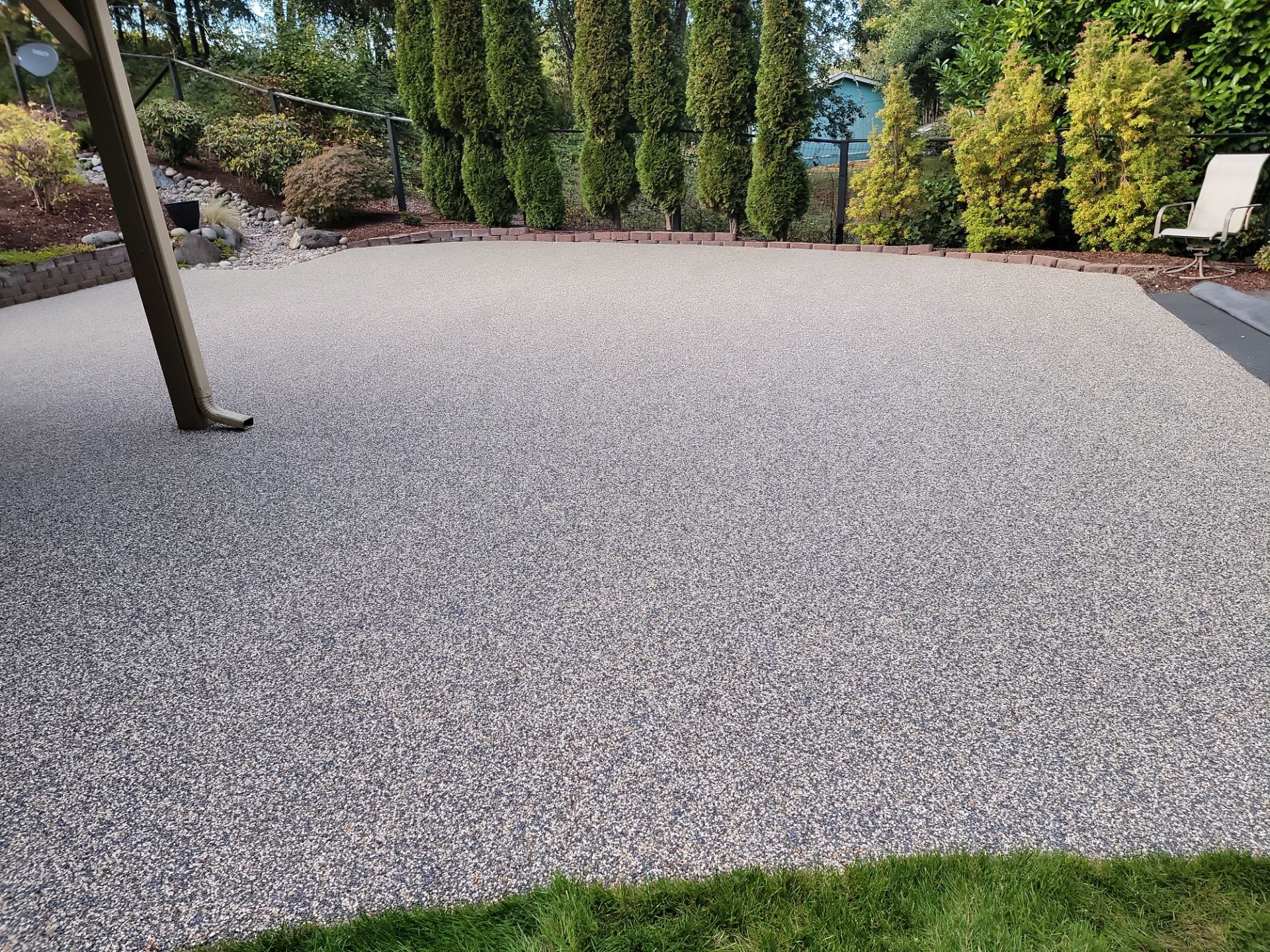 Walkway and driveway by Concrete Coating Experts Inc.