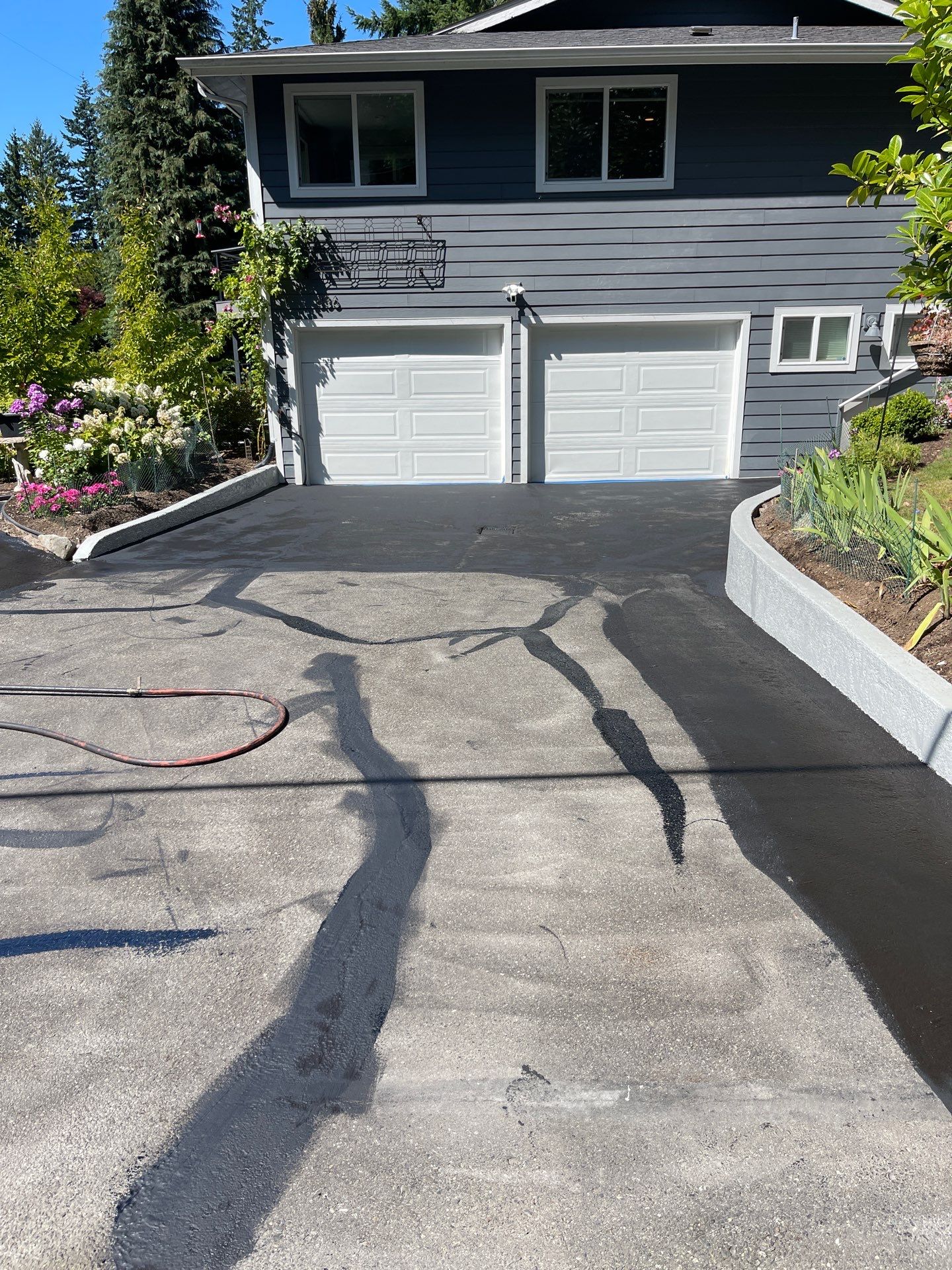 Epoxy Stairs & Sealcoat Driveway Application by Jireh Asphalt & Concrete Inc 
