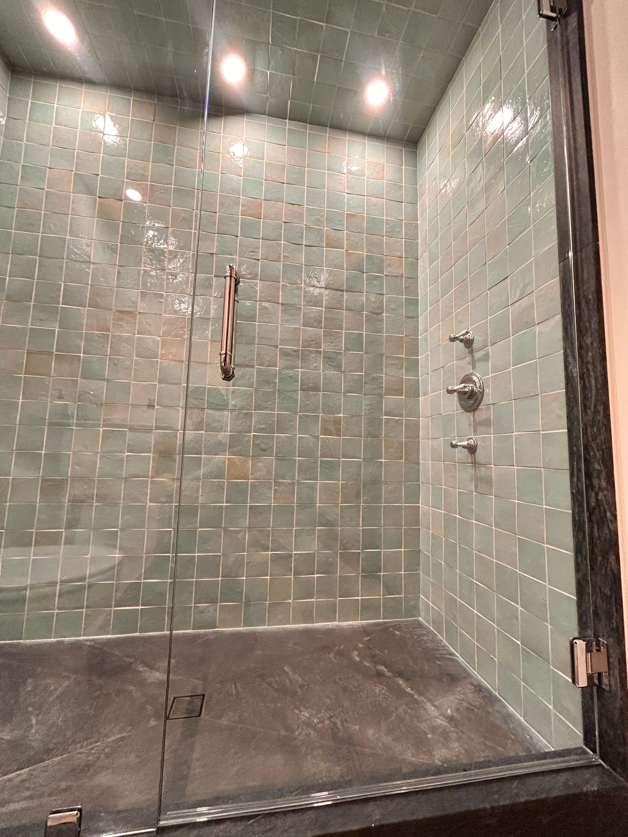 Two Showers using Tempered Shower Glass with Customer Supplied Shower Pulls by Cheshire Glass Company
