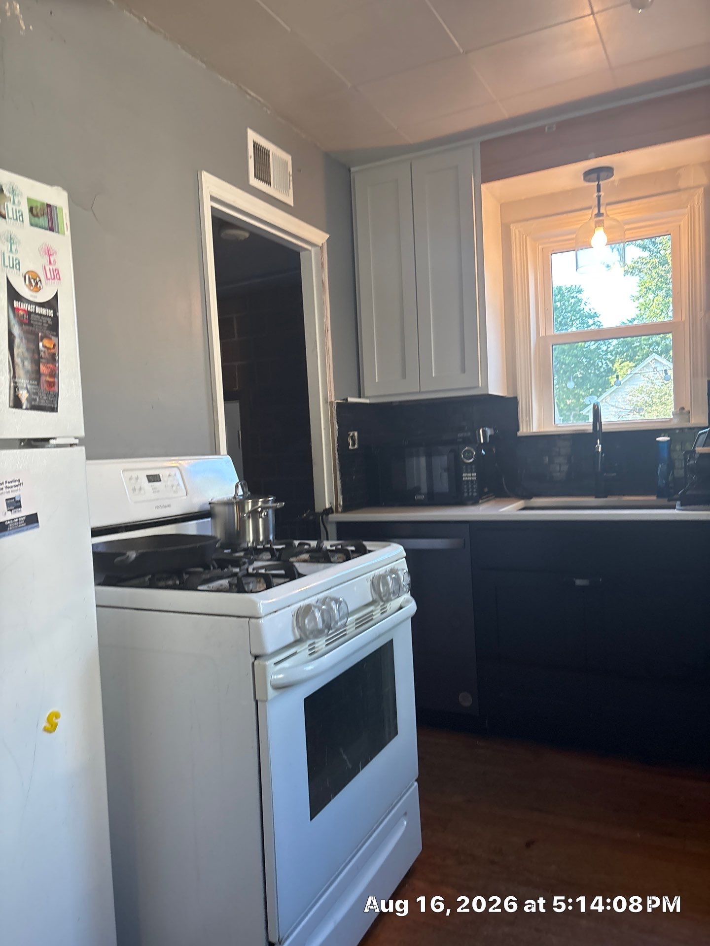 Modern Two-Tone Kitchen Remodel With Quartz Countertops in Lincoln by CompanyCam Sales Demo