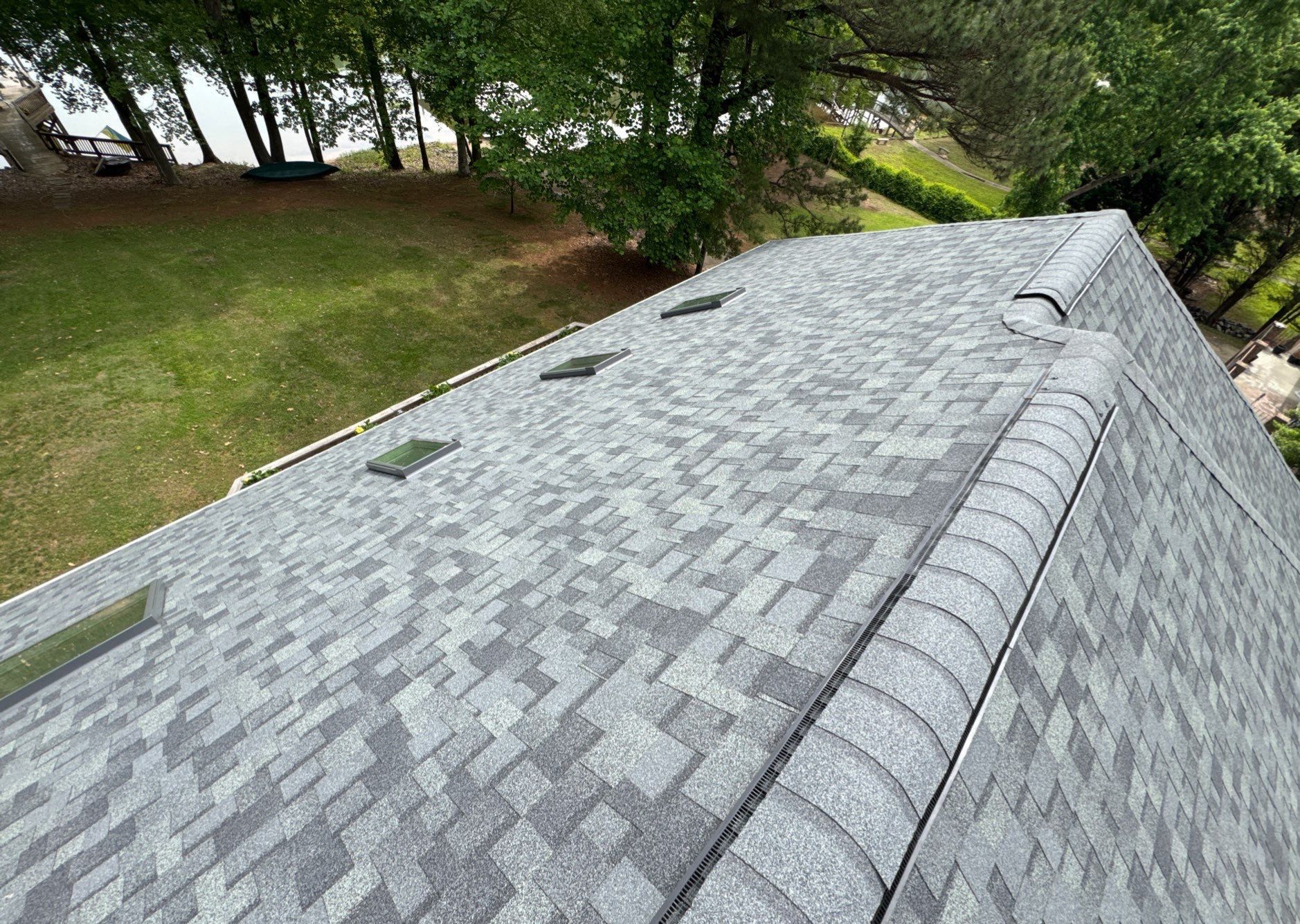 Residential Roof Replacement with Owens Corning Duration Architectural Shingles and 5 Velux Skylights in Charlotte, North Carolina by Merritt Roofing LLC