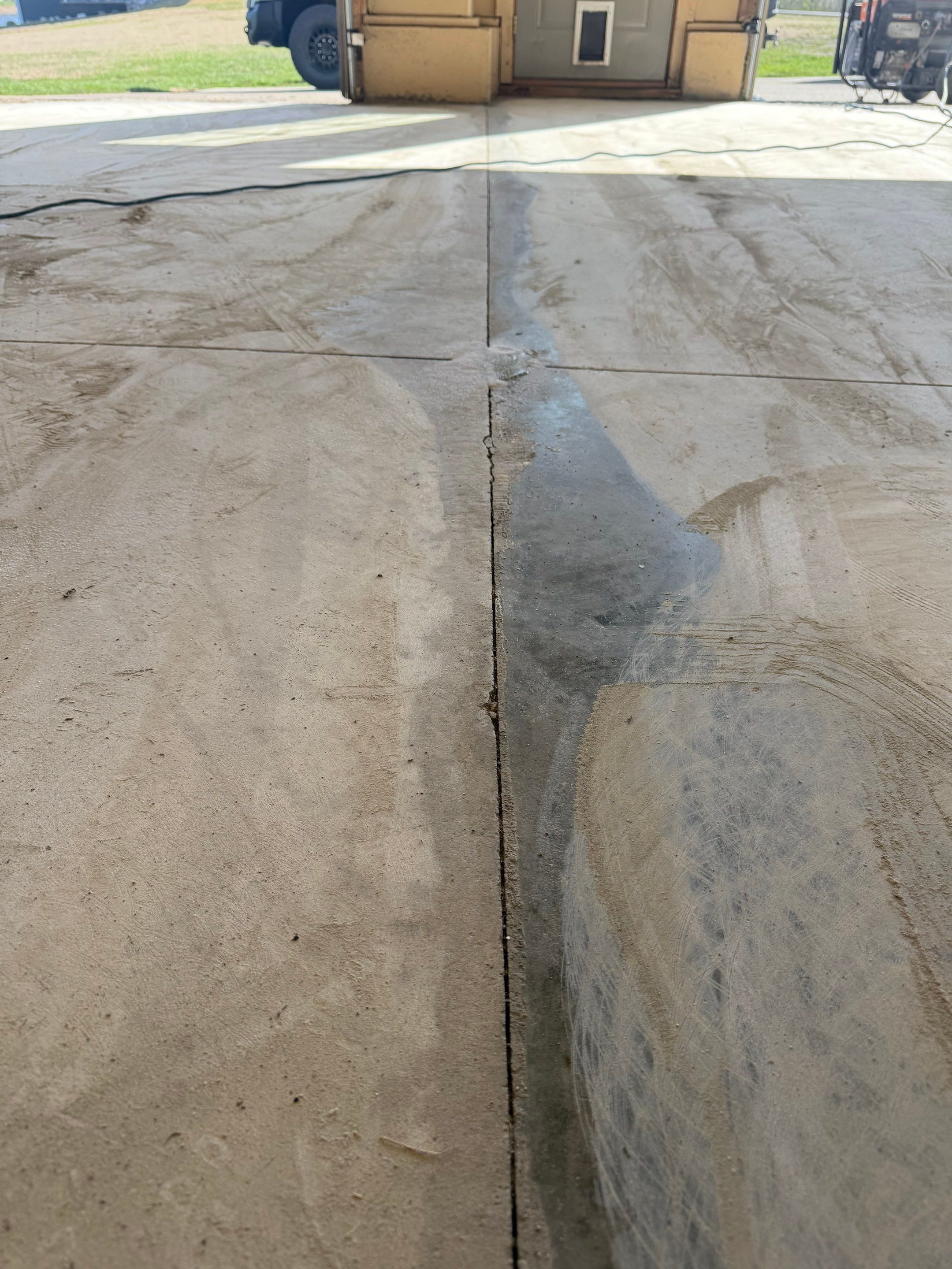 Residential Garage Floor Transformation with Speckled Epoxy Coating by Select Painting, Coatings & Garage Cabinets