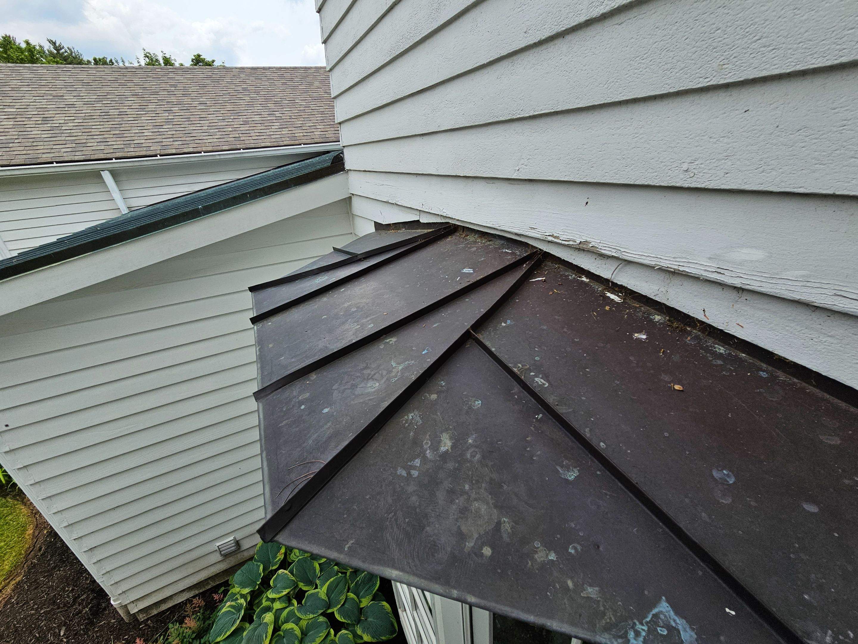 Copper Roof using Copper by Absolute Roofing and Construction