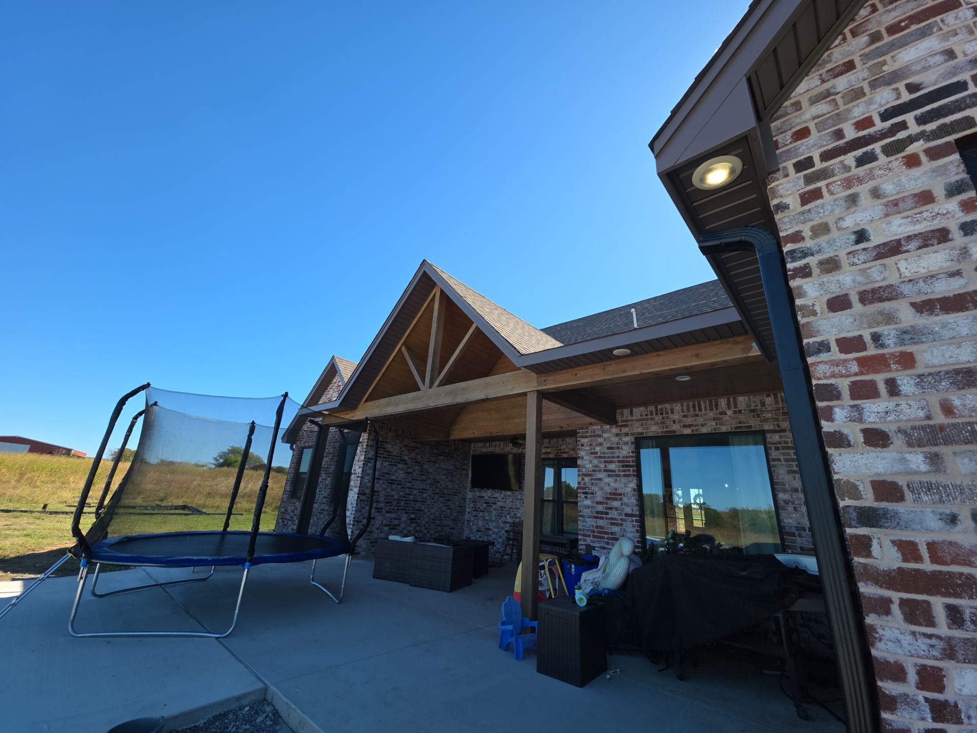 Fascia and door frames wrapped with PVC coil & soffit installation by In & Out Construction & Remodeling, LLC