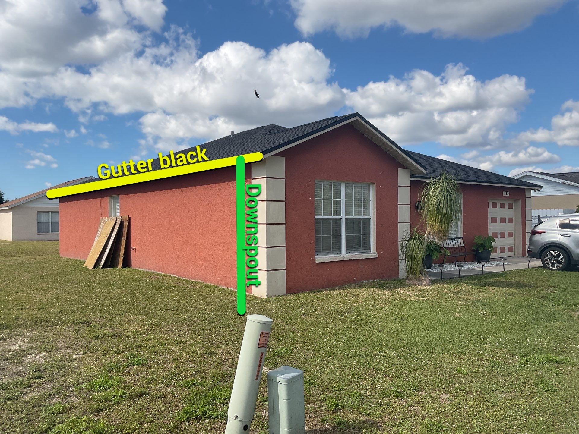 Black Seamless Gutters and Downspouts in Fort Myers FL by Gutter Professors