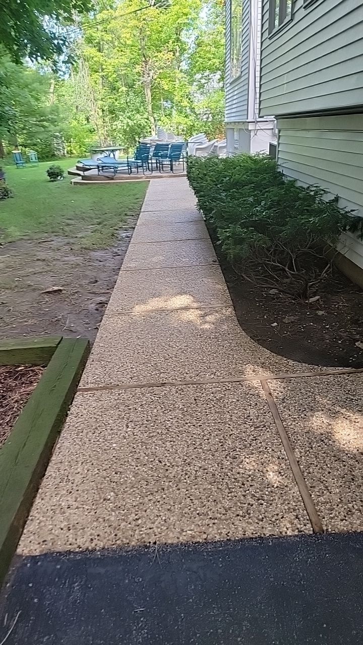 Housewashing  using Algaecide, soft wash soap by Northern Power Washing LLC.