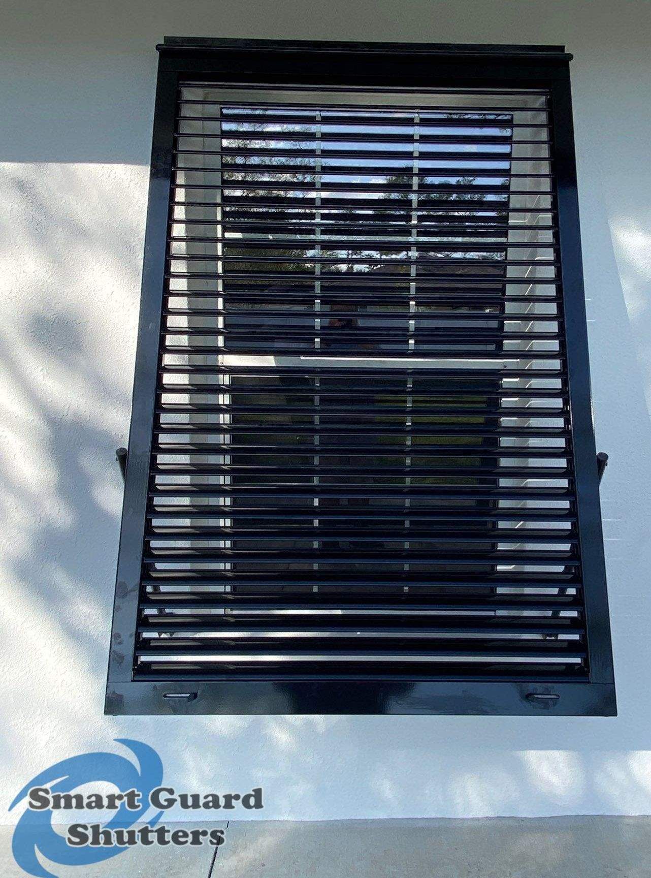 Impact Bahamas in Jet Black by Smart Guard Shutters