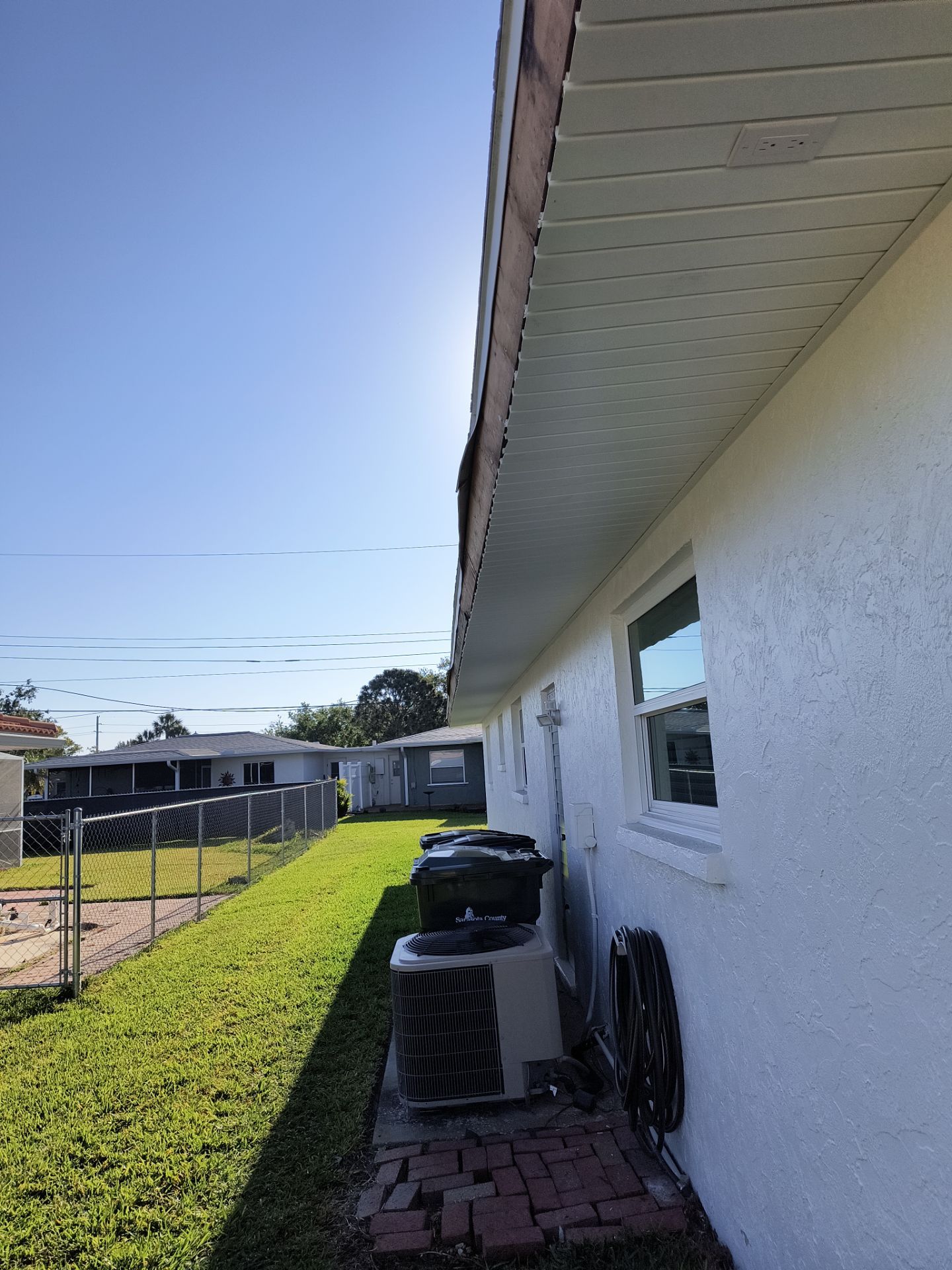 Aluminum White Soffit Installation in Sarasota FL by Gutter Professors