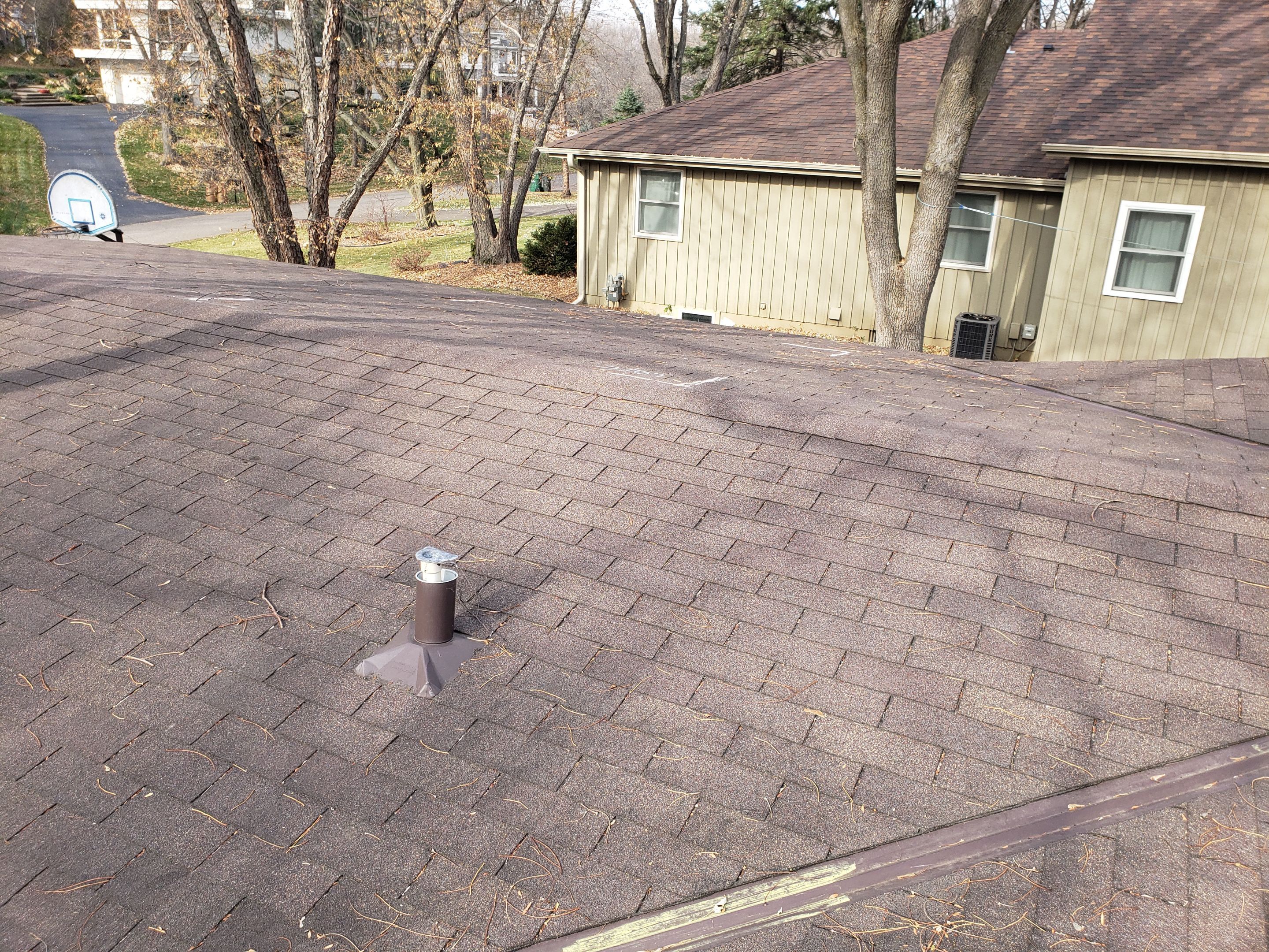 Minnetonka, MN – Low-Slope Roof Replacement with Full Ice & Water Shield by First Impressions Exteriors