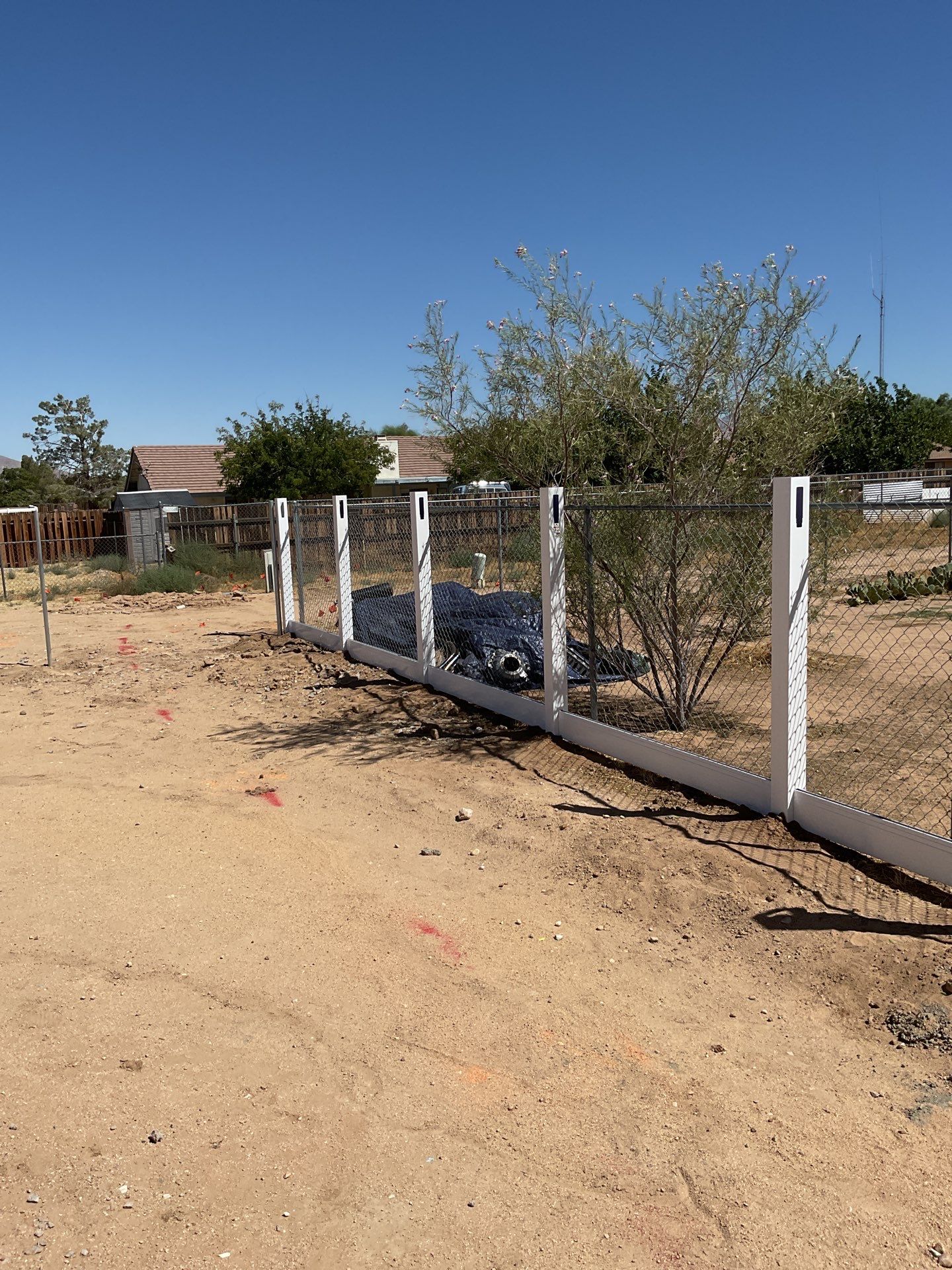 6ft White Privacy Vinyl Fence with Chain-link Fence by Fence Guys Inc.