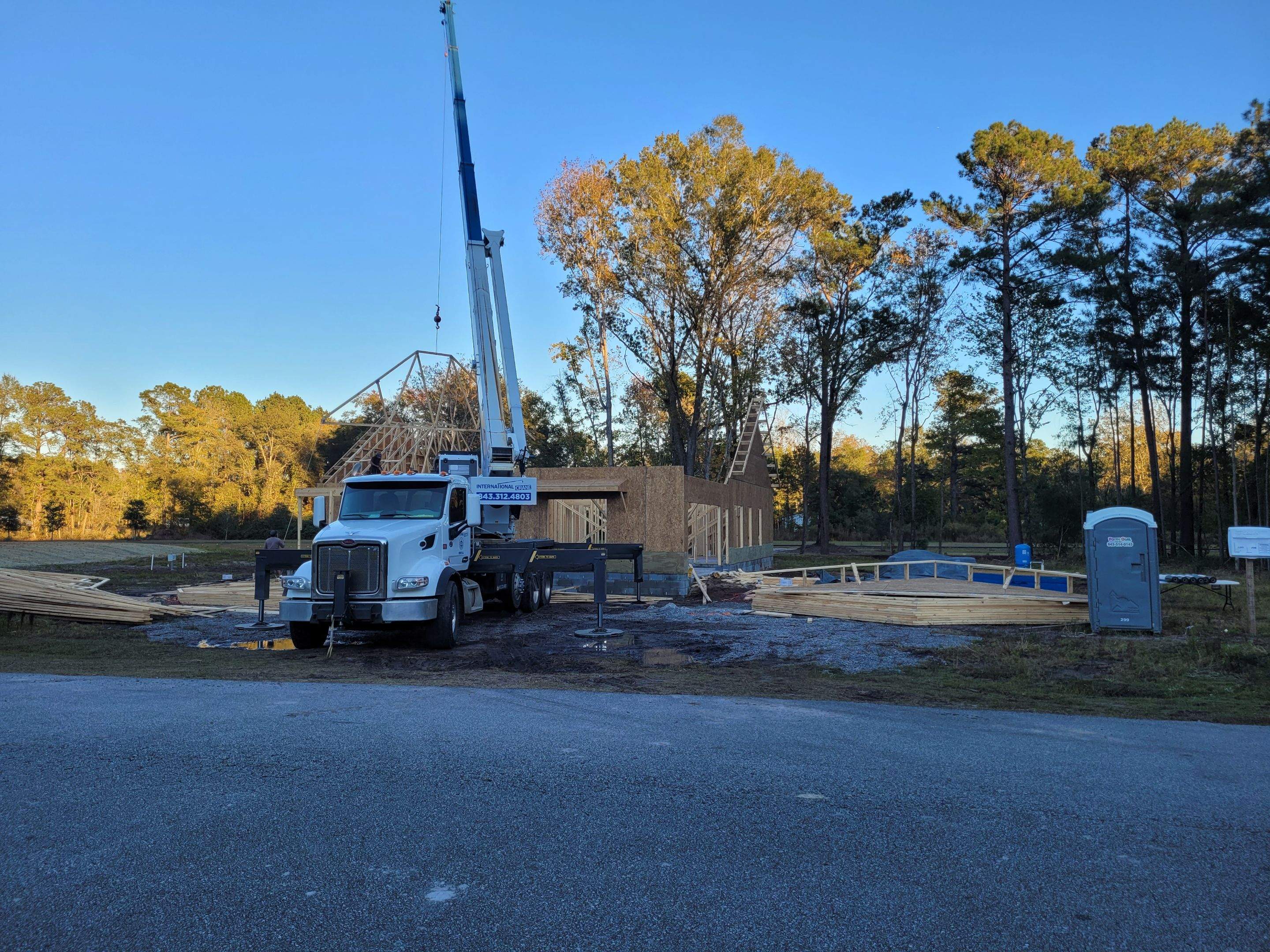 New Home Construction using brick and vertical vinyl by Cornerstone Home Builders, LLC