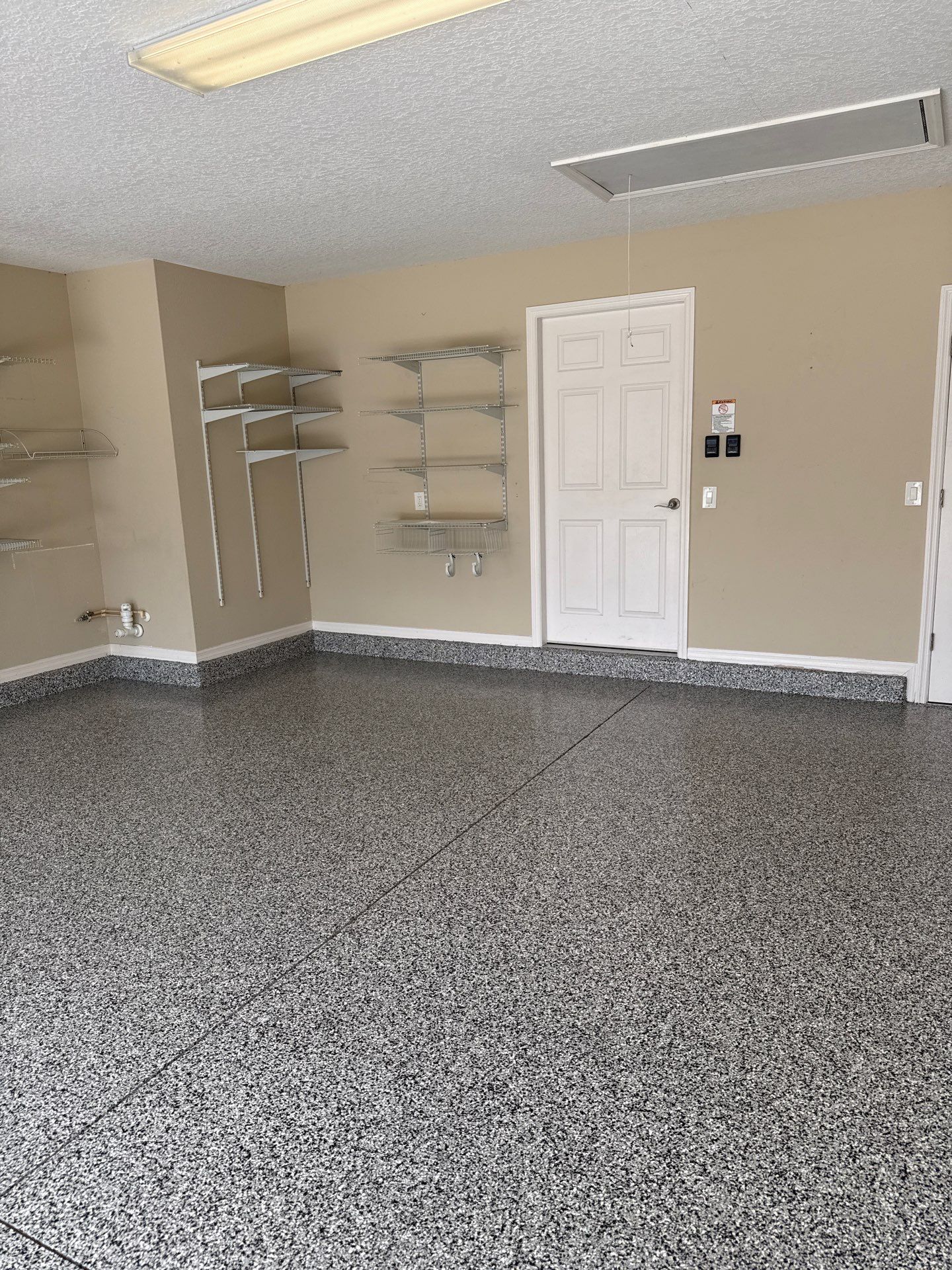 Garage in Domino by Innovative Concrete Coatings 