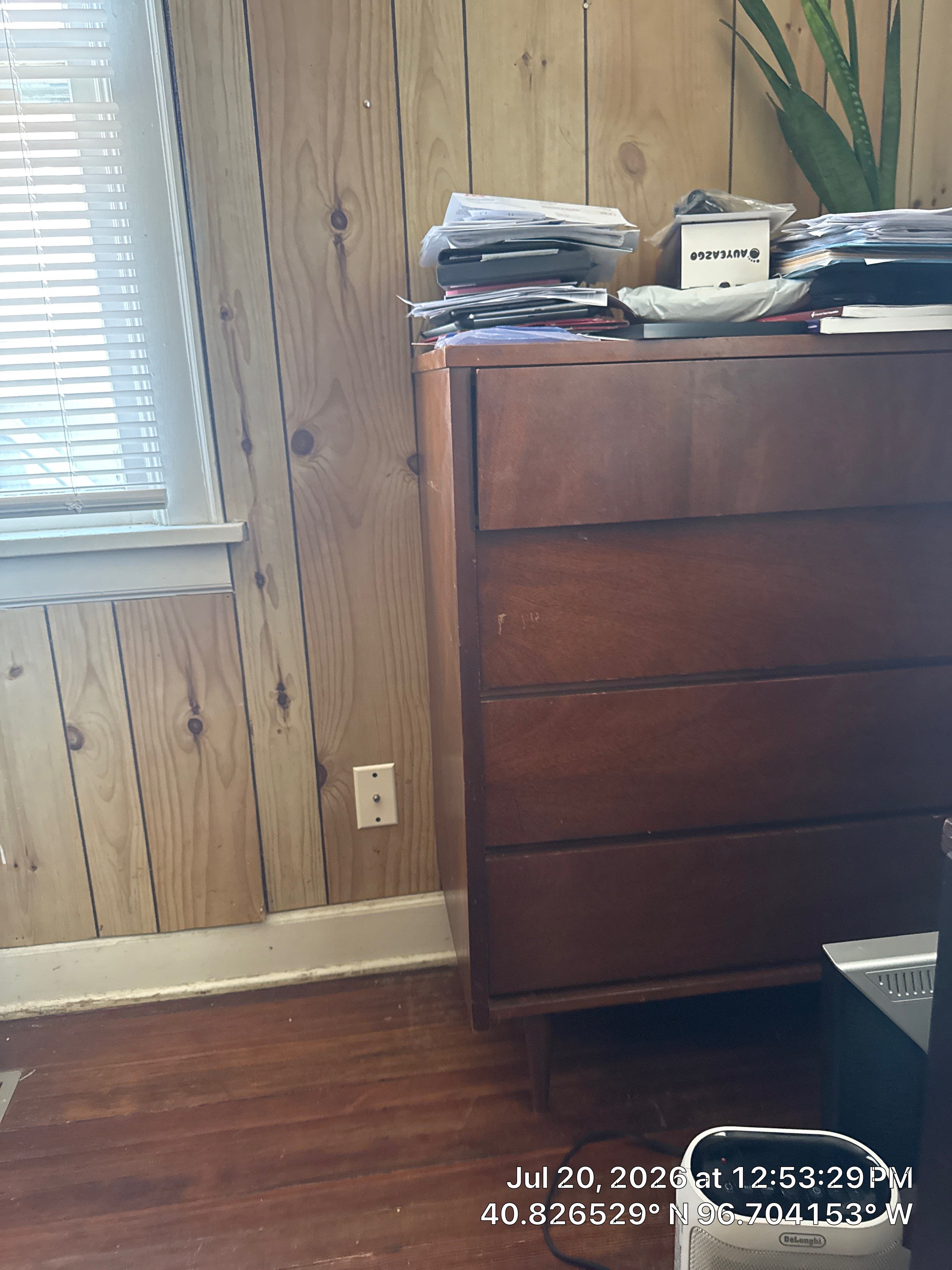 Commercial Office Remodel Featuring Knotty Pine Paneling and Hardwood Floors by CompanyCam Sales Demo