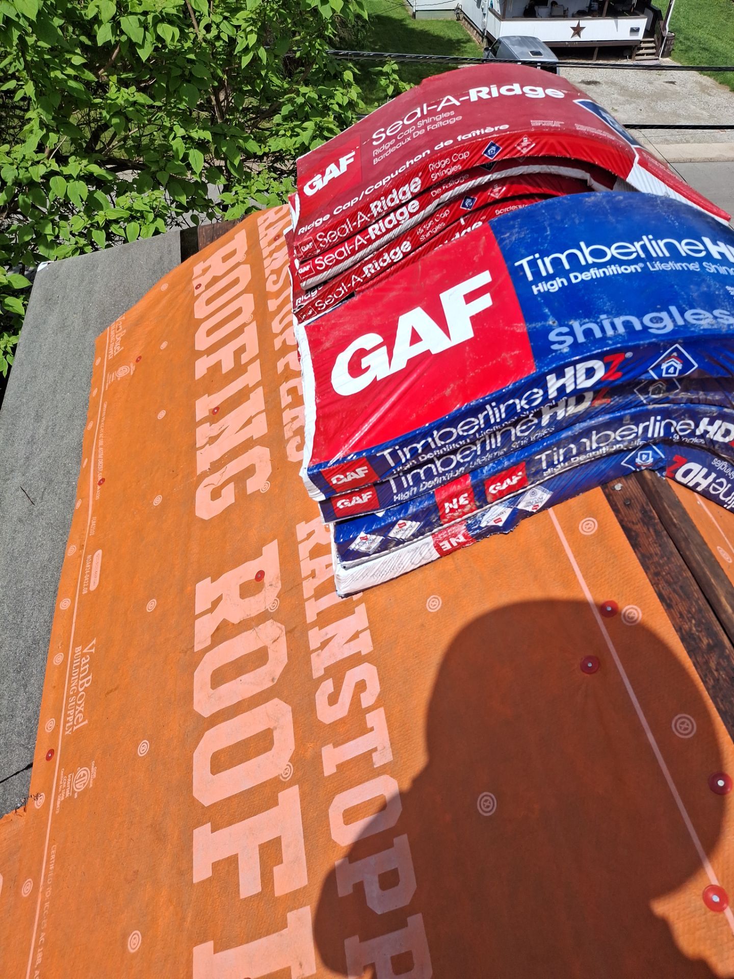 Residential Roofing Installation using GAF Timberline HDZ Charcoal by Rainstoppers Roofing