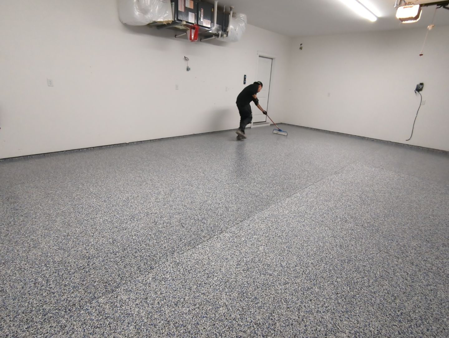 Garage Transformation using Domino with Blue by Croc Coatings, LLC