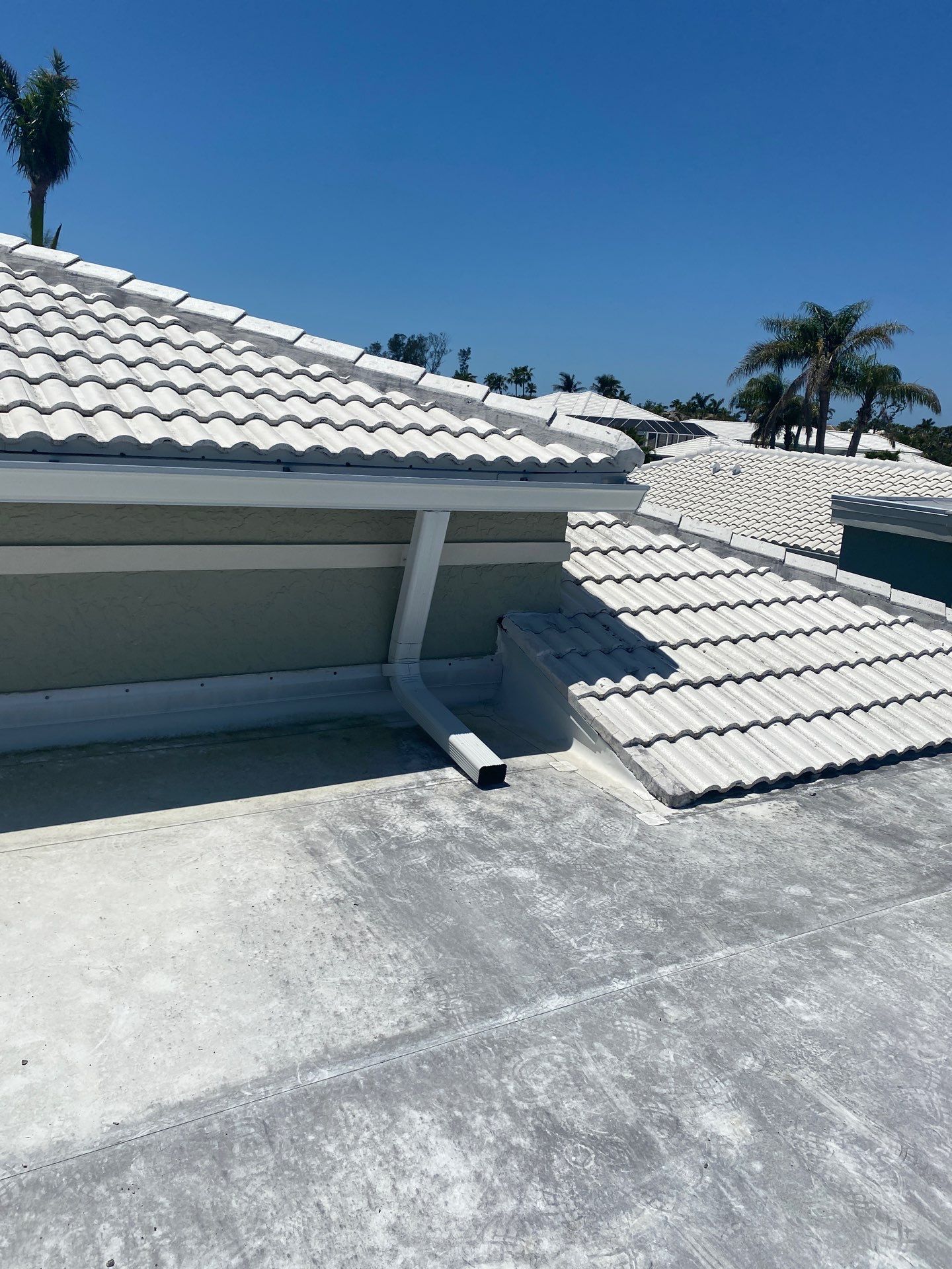 Splash Guard Gutters for Coastal Homes in Longboat Key FL by Gutter Professors