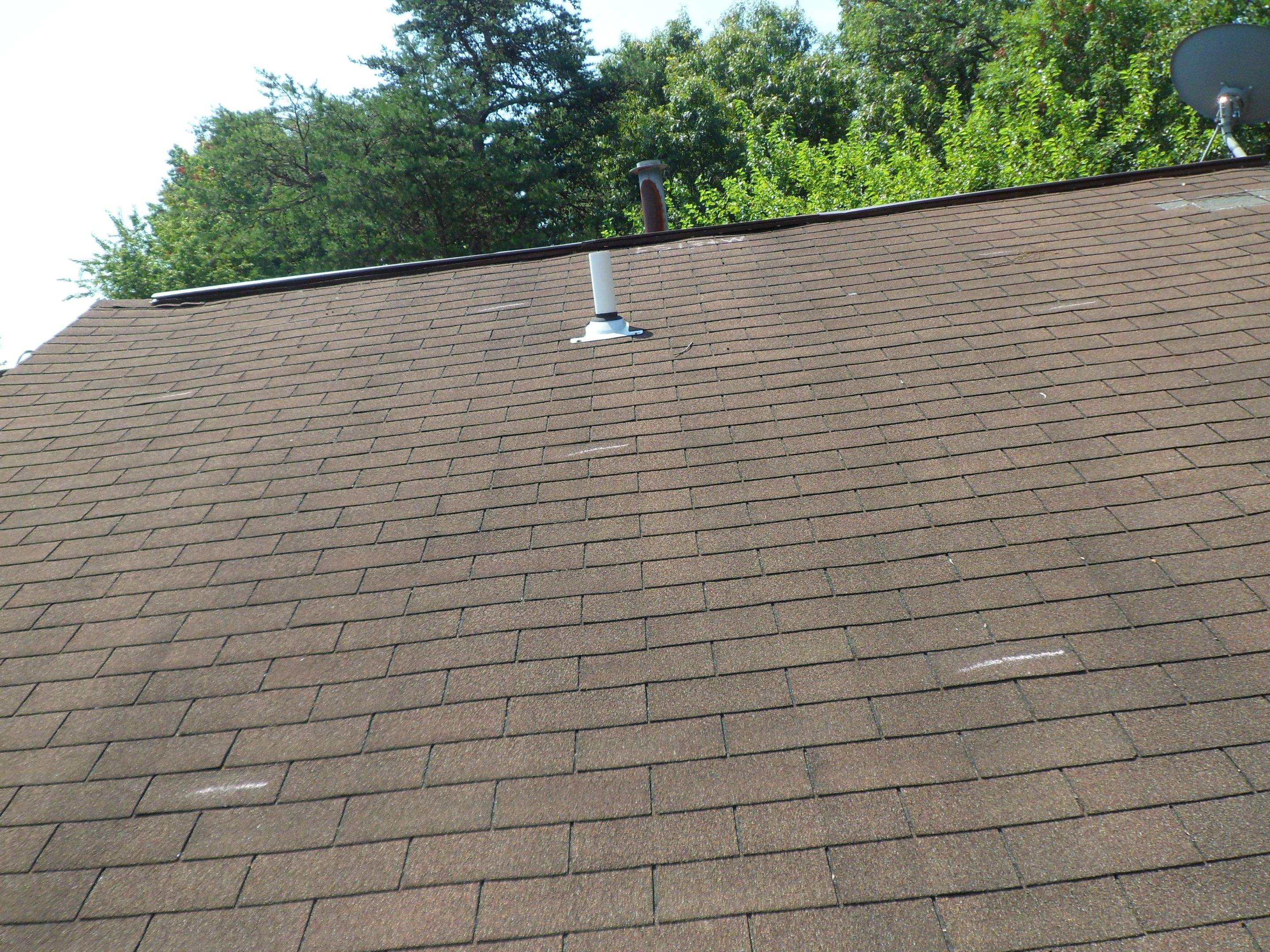 Residential Roofing Installation using Landmark Shingles Color Weatherwood by Alpha Design Services