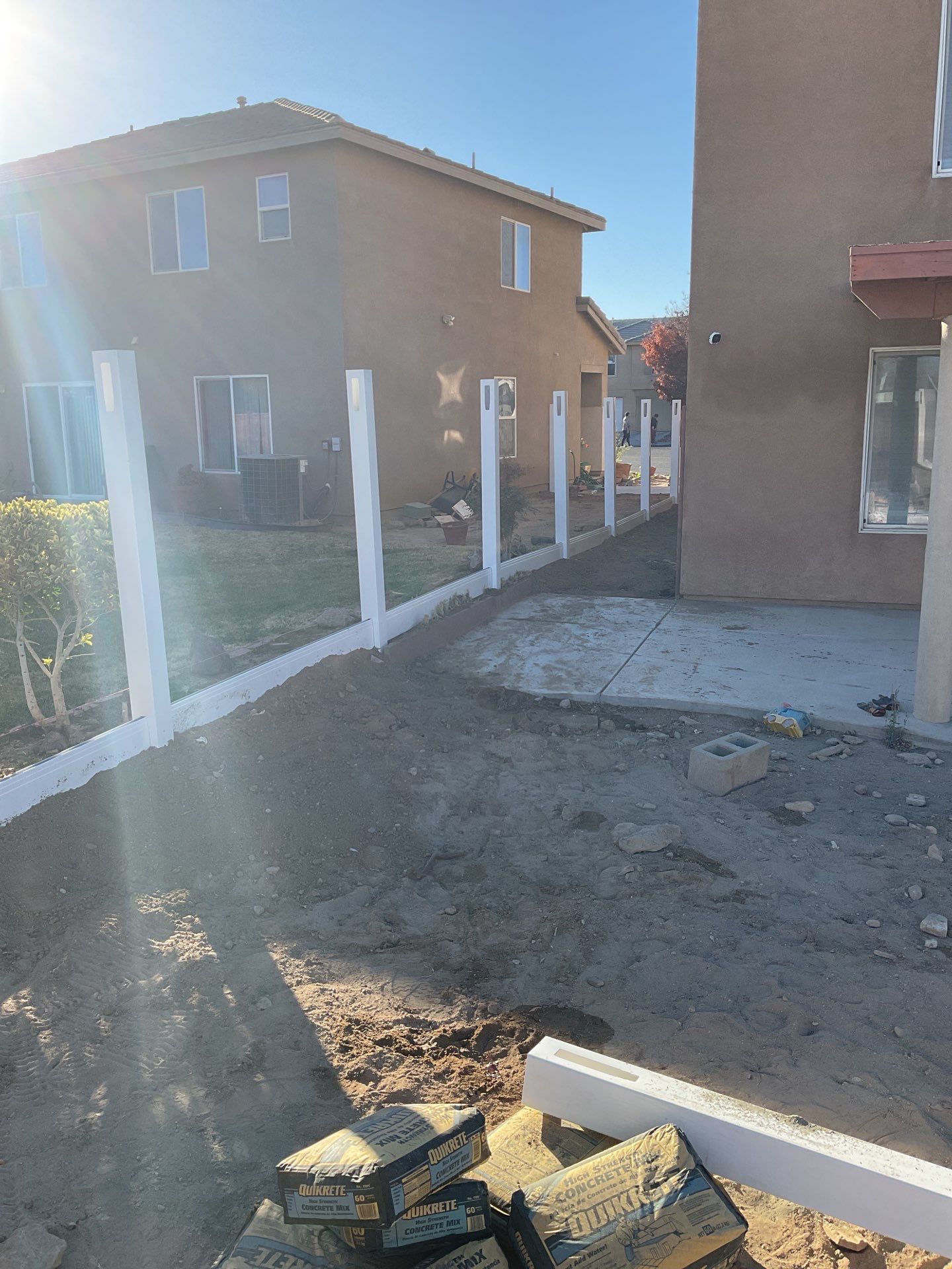 Fence installation using wood by Fence Guys Inc.