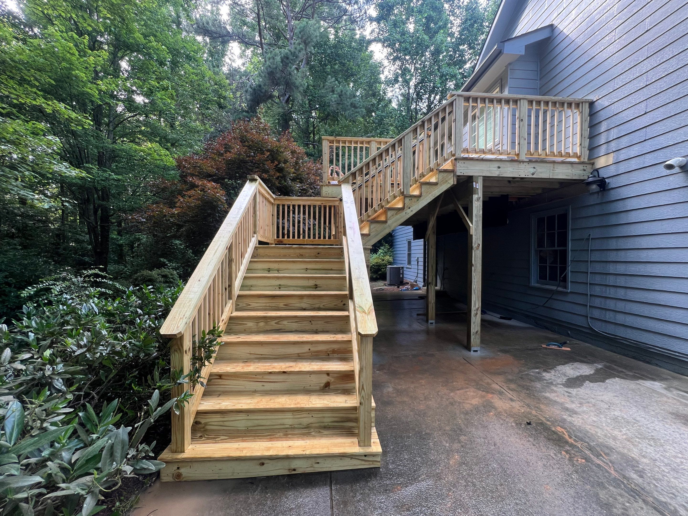 Pressure-Treated Wood Deck Replacement and Staircase Installation in Kennesaw by Swift Home Renovations