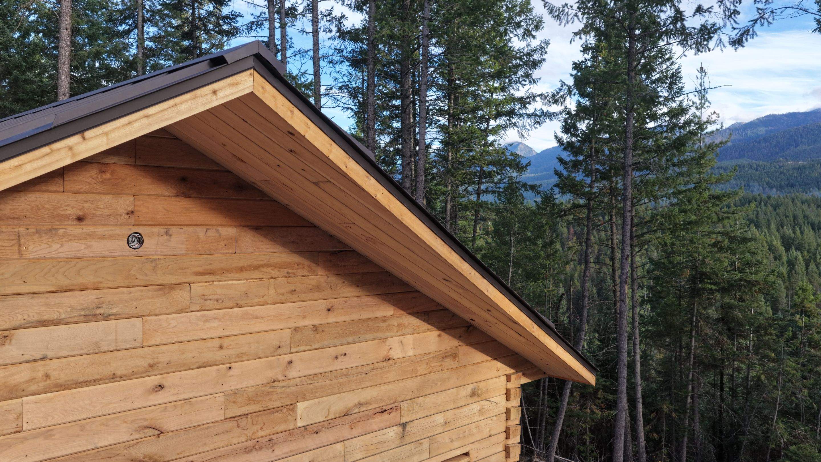 Mechanical Lock Standing Seam - CMG ULG Dark Bronze  by Montana Roofing Solutions
