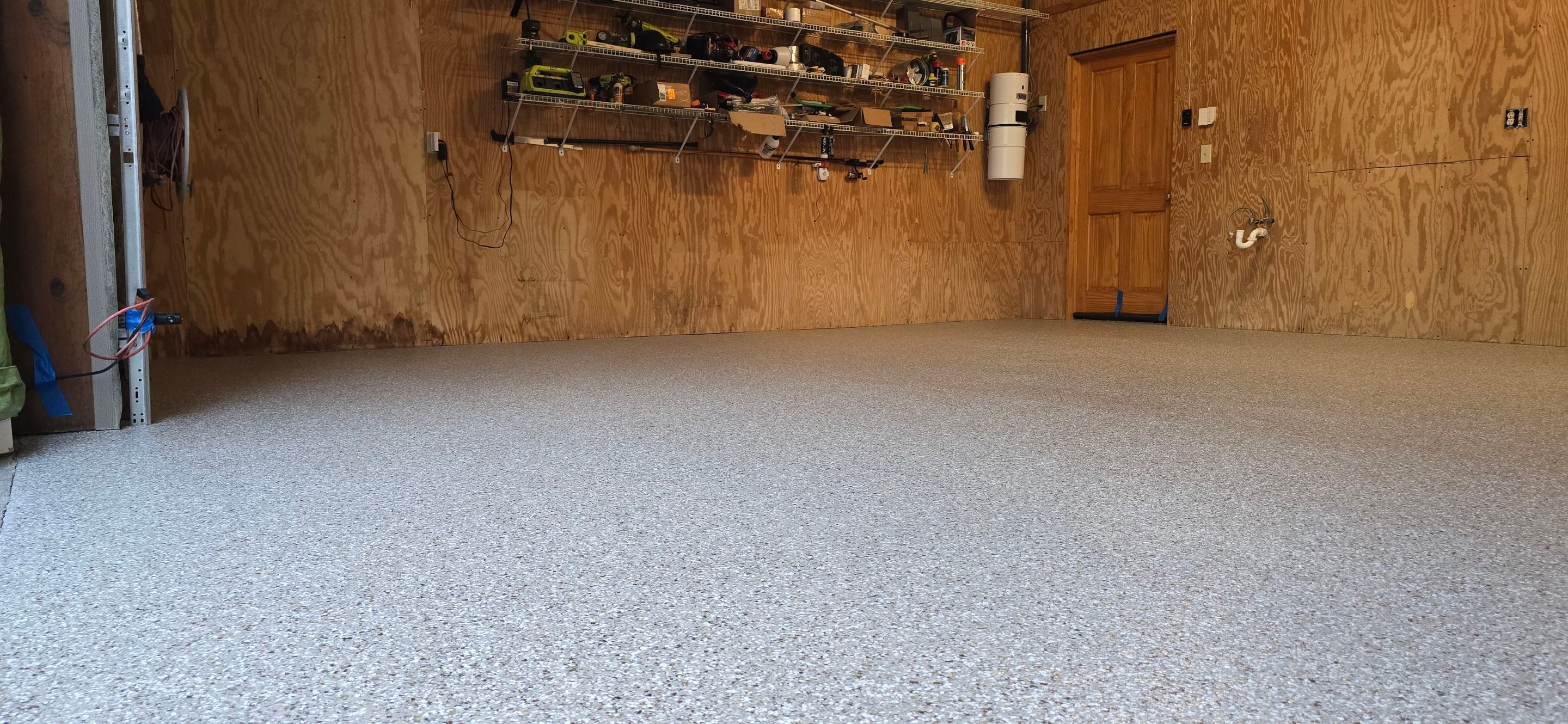 Garage & Sidewalk using Creekbed by Elite Floor Solutions