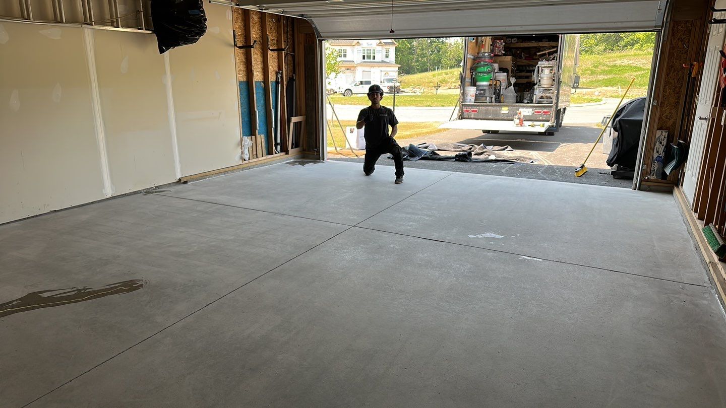 Silverado garage floor coating  by NG Masonry & Construction LLC