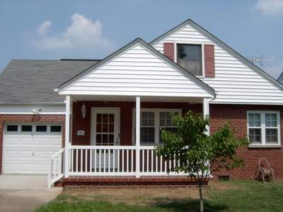 New front porch build, with tile floor and vinyl railing.