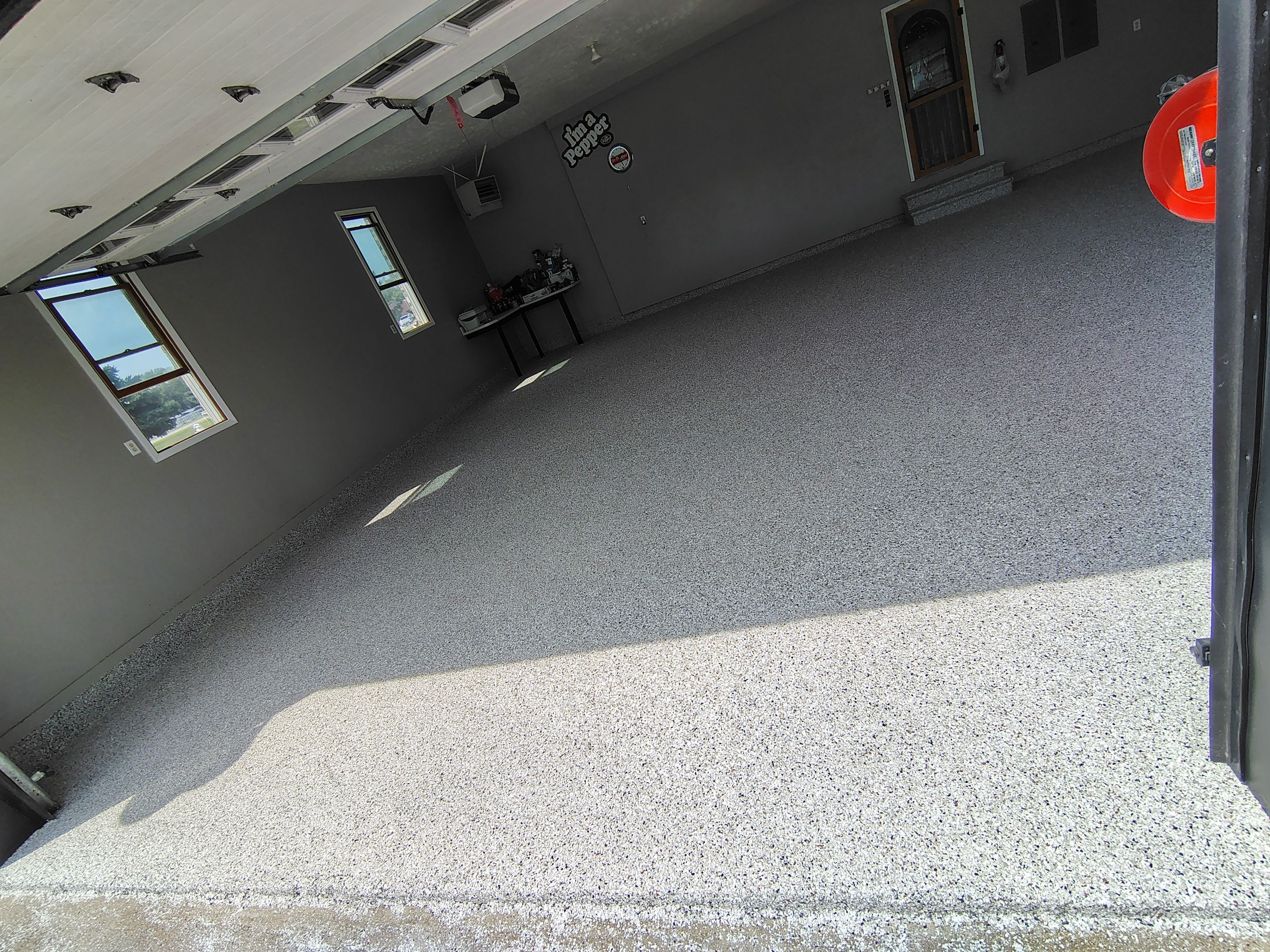 Garage Concrete Floor Coating and Crack Repair in Onawa by Select Painting, Coatings & Garage Cabinets