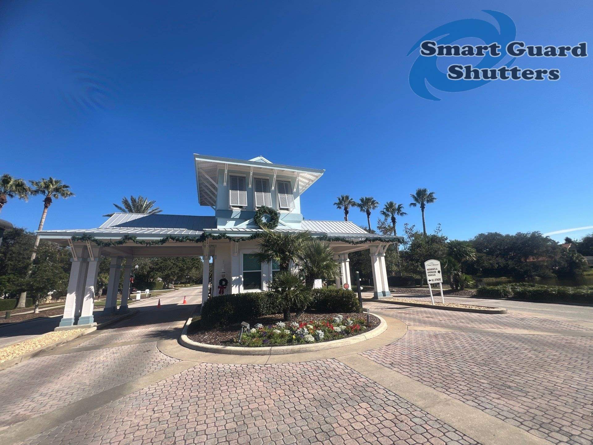 Decorative Bahama Shutters in Window Grey by Smart Guard Shutters