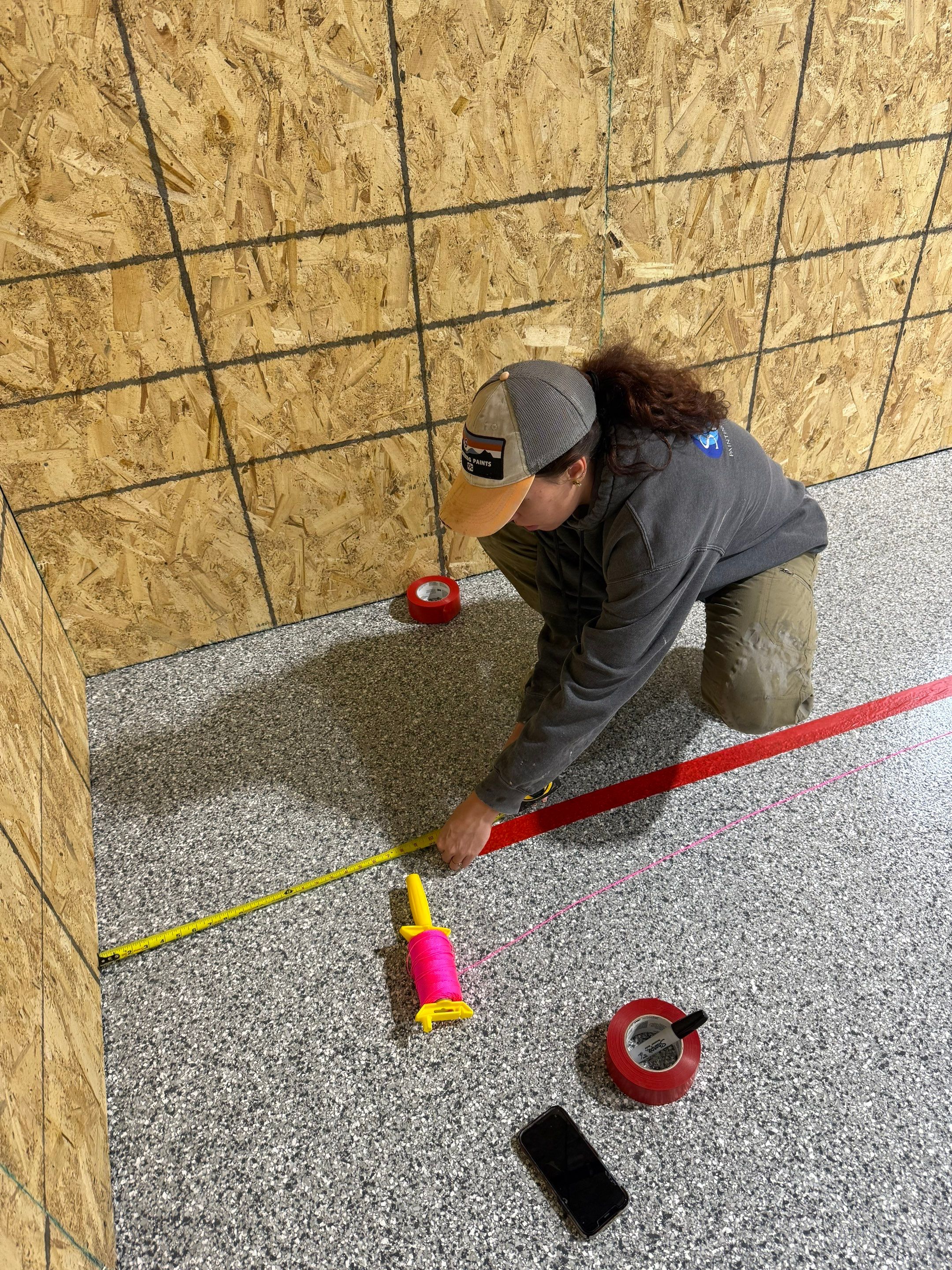 Custom Polyurea Shop Floor with Basketball Court Lines in Rock Valley by Select Painting, Coatings & Garage Cabinets