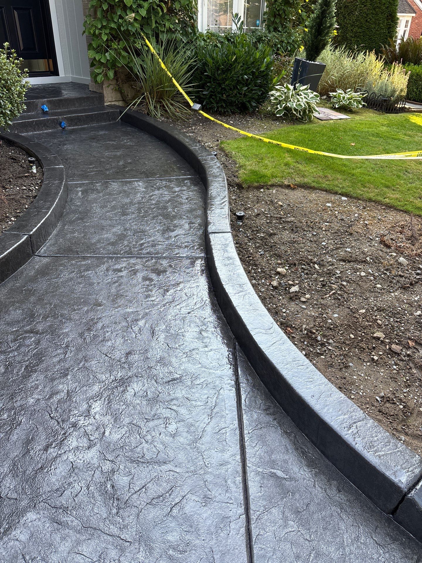 Multi-color Stamped & Sealed Concrete Driveway Renovation | Mukilteo by Jireh Asphalt & Concrete Inc