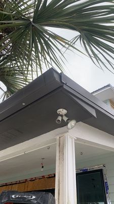 Seamless Gutter Installation using Charcoal Grey Gutters