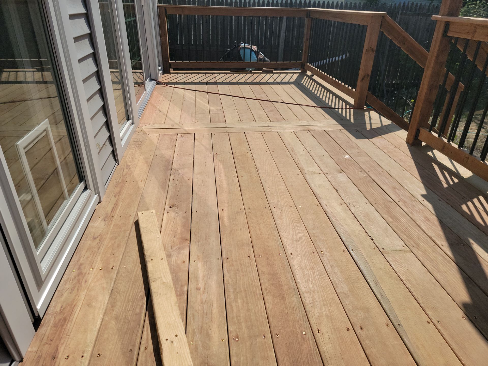 TREATED LUMBER DECK  by Avalon Roofing and Exteriors