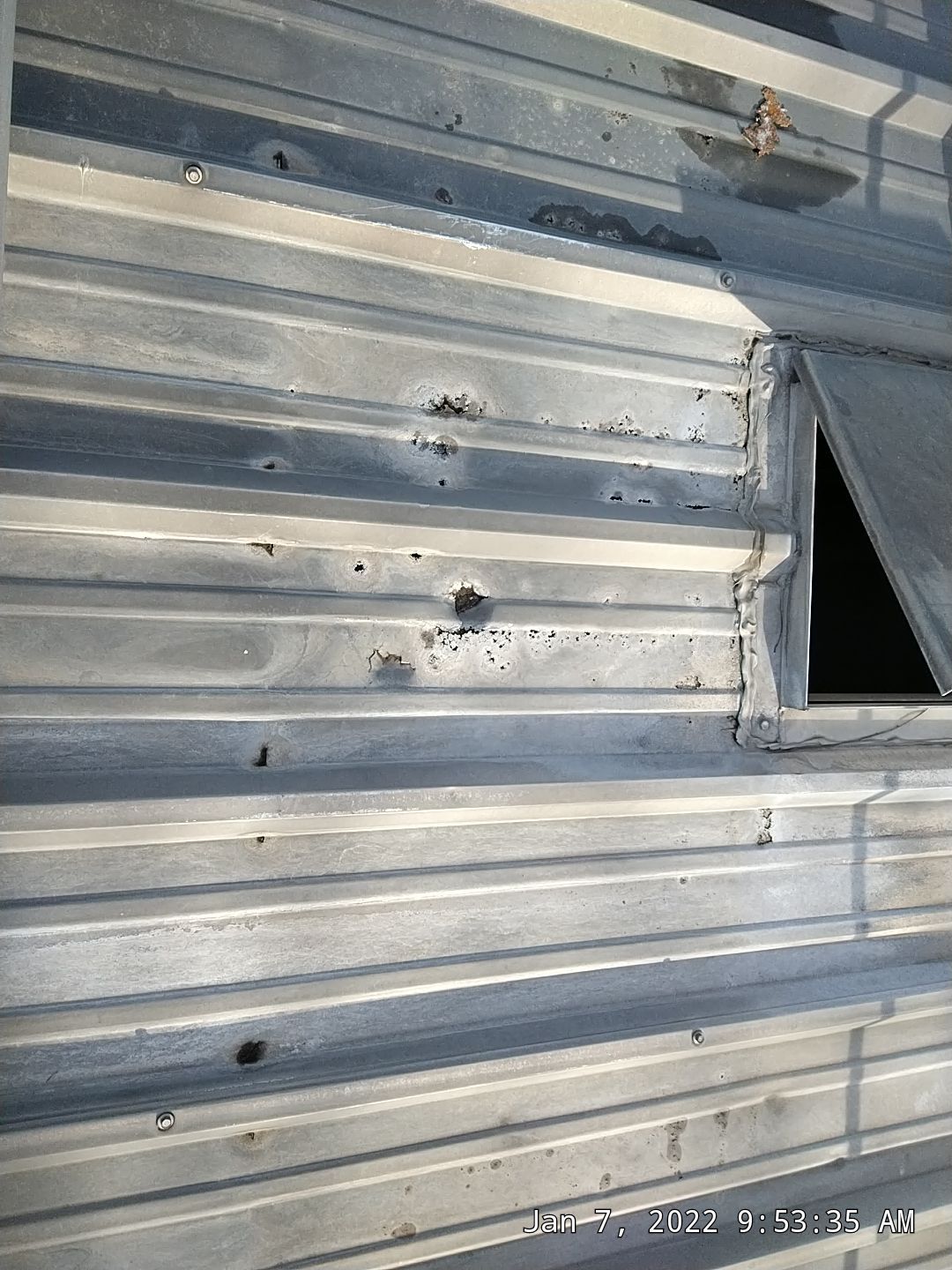 Commercial Roofing Installation using Aluminum Roofing panels by Hostetler Roofing