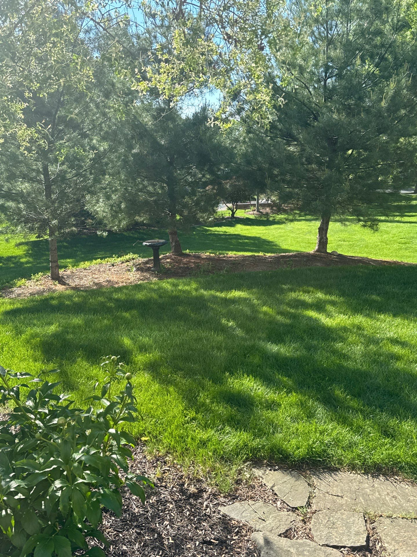 Backyard Retreat: Techo-Bloc Patio + Firepit Lounge by Saylor’s Lawn & Landscape