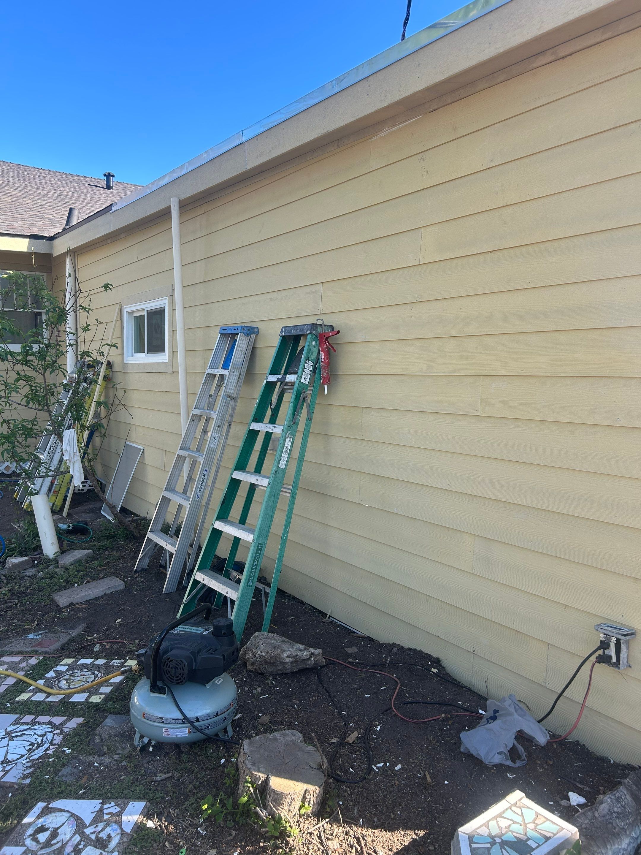 Mid-Century Bungalow by Bayfront Roofing and Construction