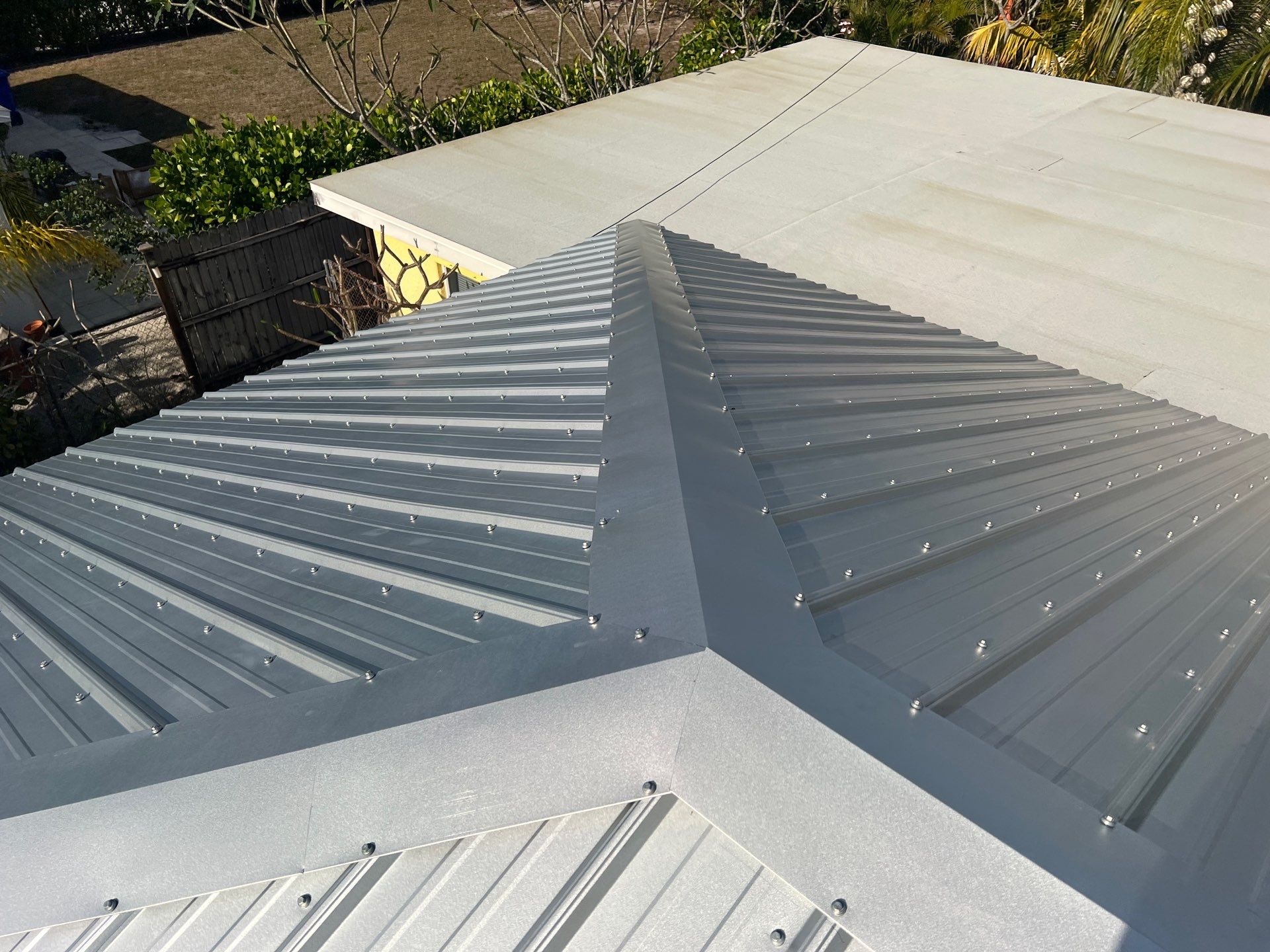 Residential Roofing Installation using Durabull Classic Rib Panel by Durabilis Roofing INC