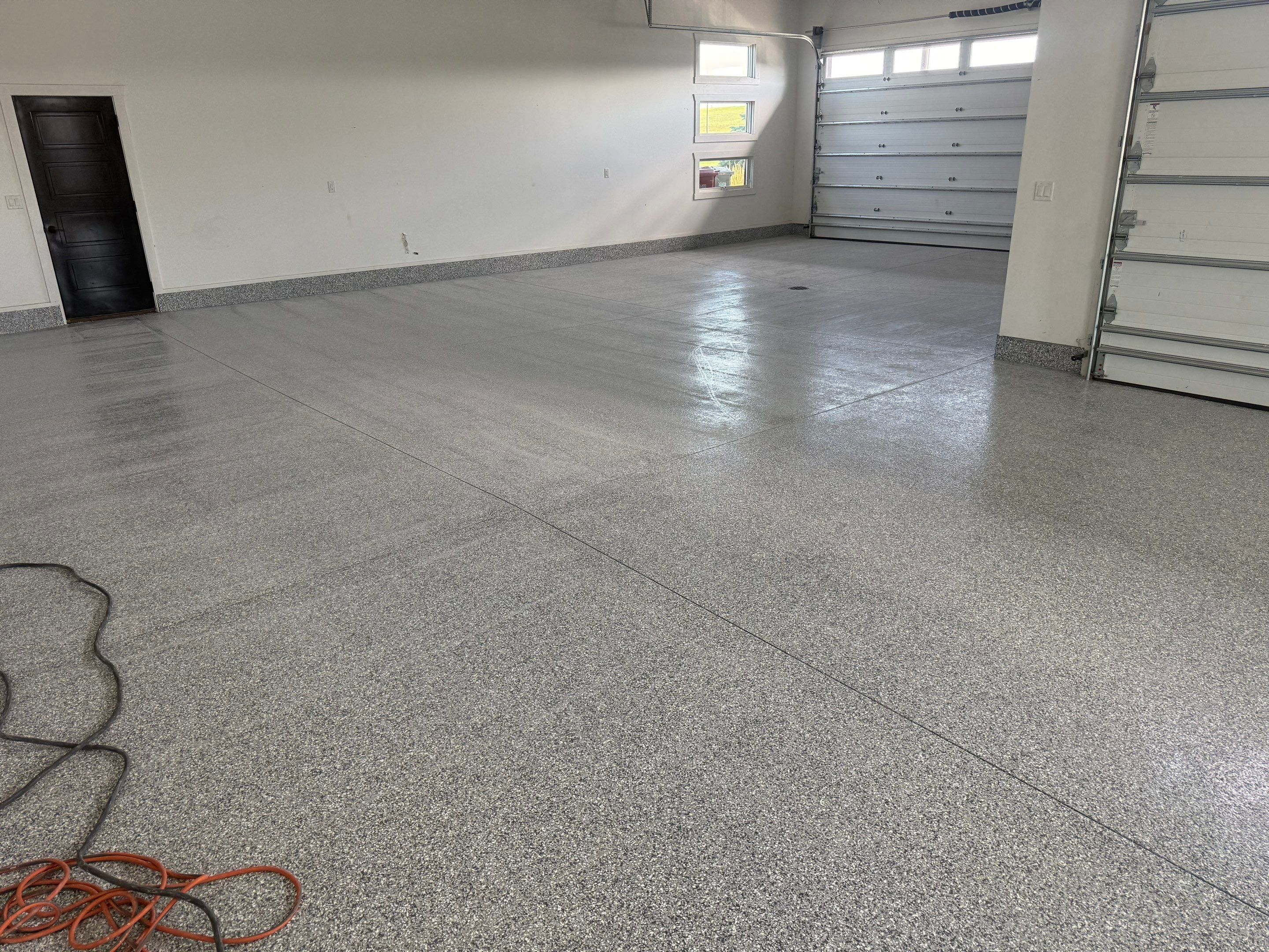Gravel Flake Garage Floor Coating in Yankton by Select Painting, Coatings & Garage Cabinets