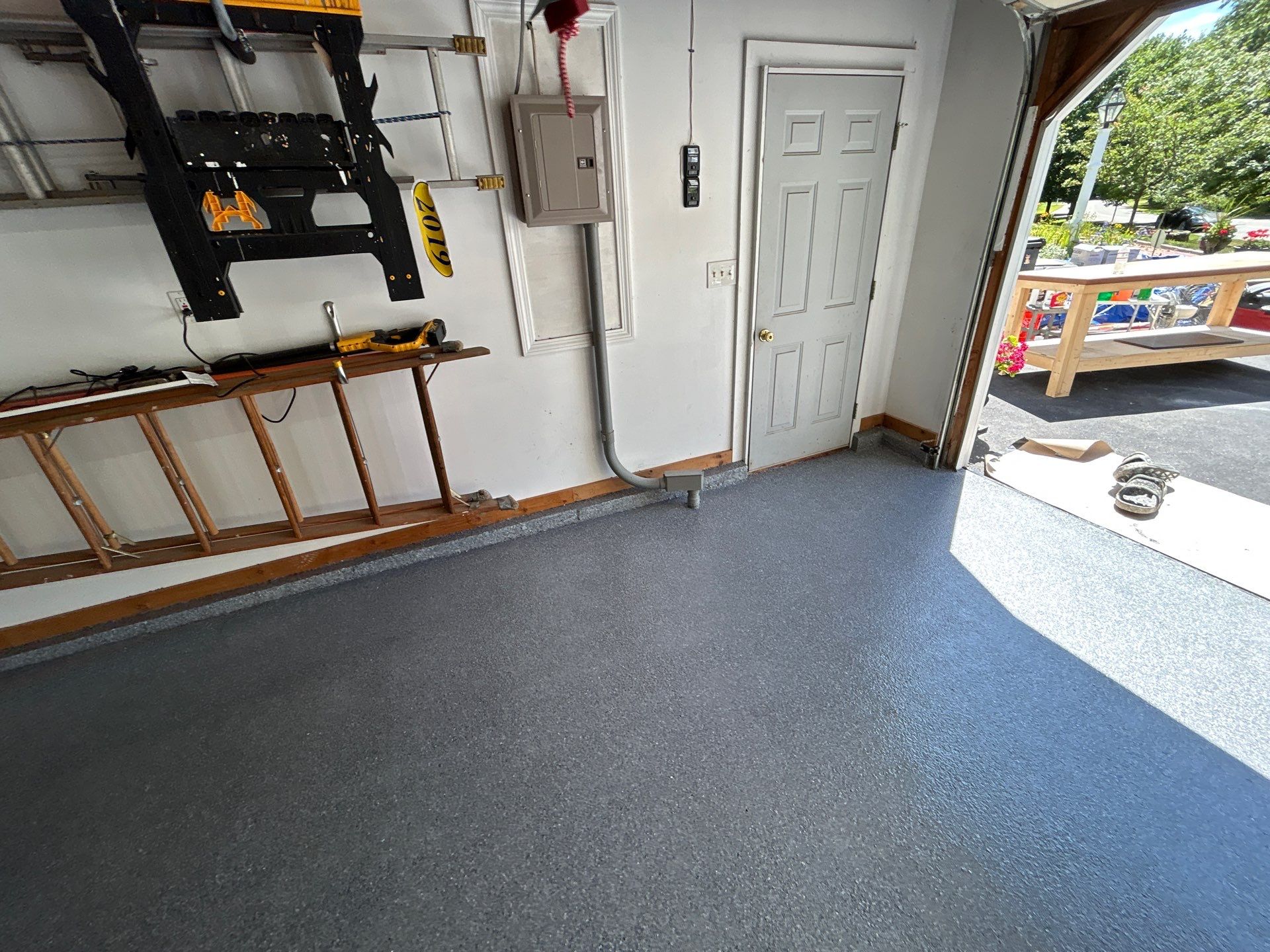Garage in Londonderry, NH 03053 by Symphony Concrete Coatings