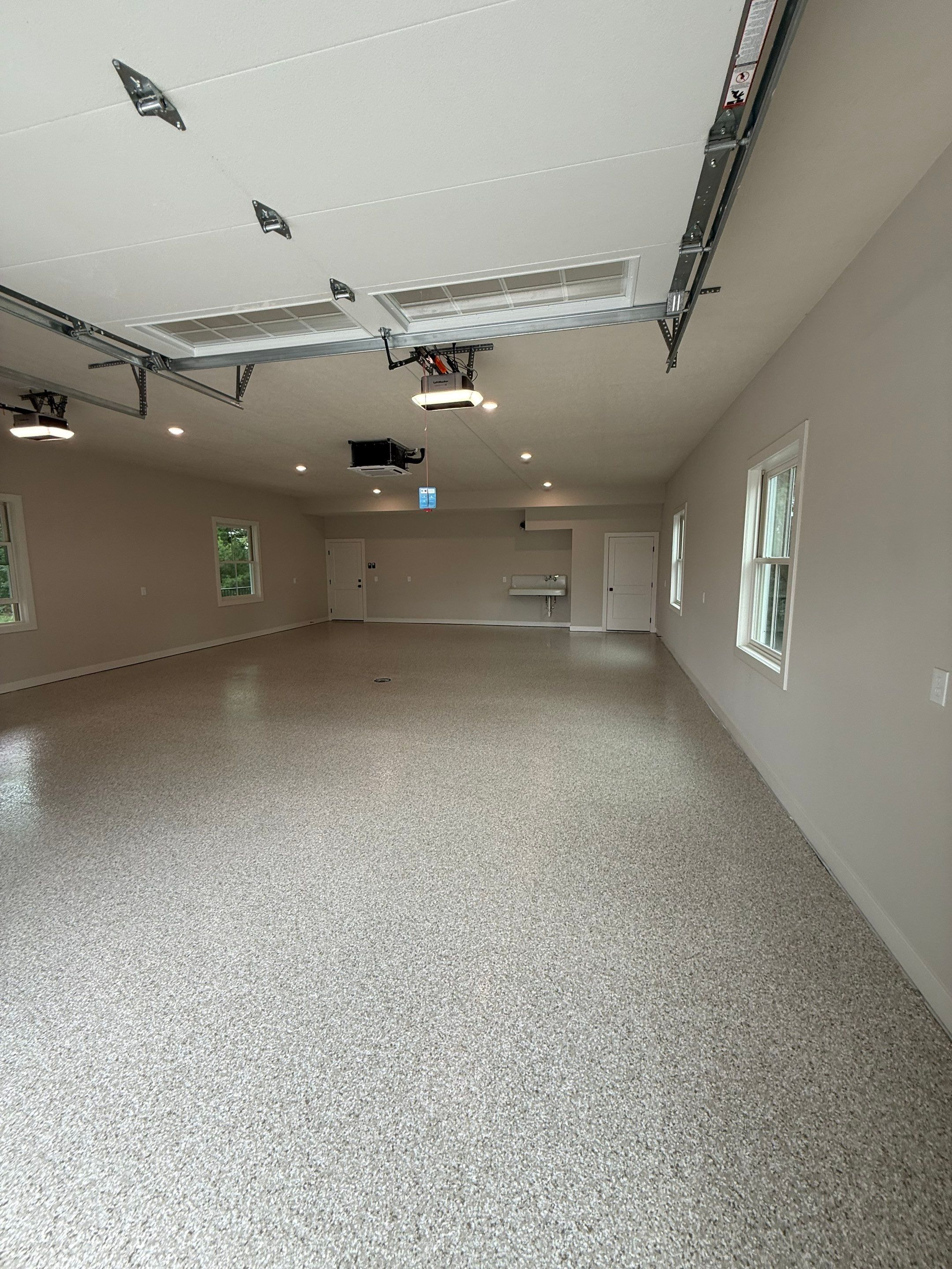 Trail Mix Epoxy Garage / Even Space by Goat Coatings