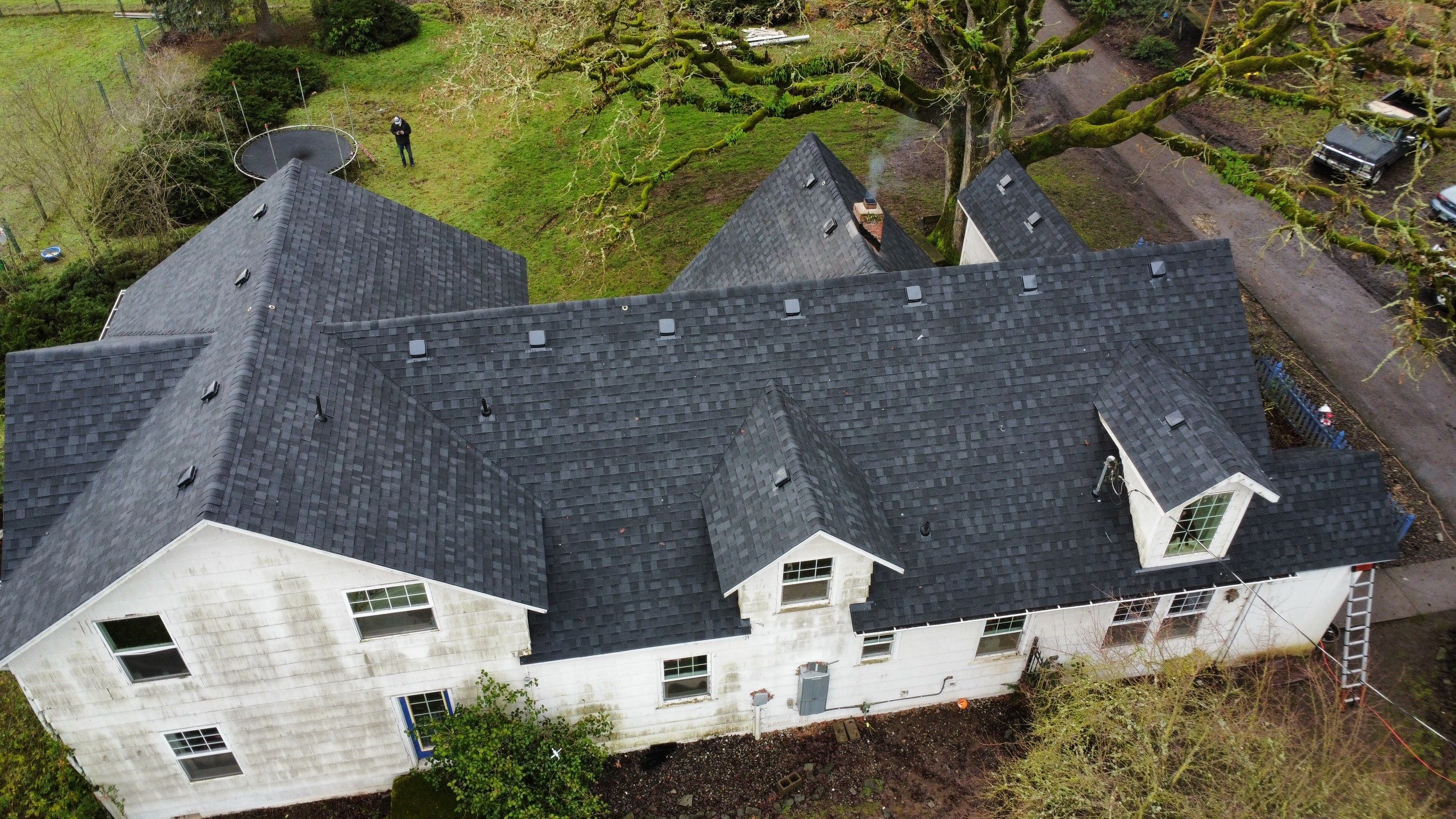 Residential Roofing Installation using IKO Dynasty (Color: Granite Black) by Orezona Building & Roofing Company, Inc.