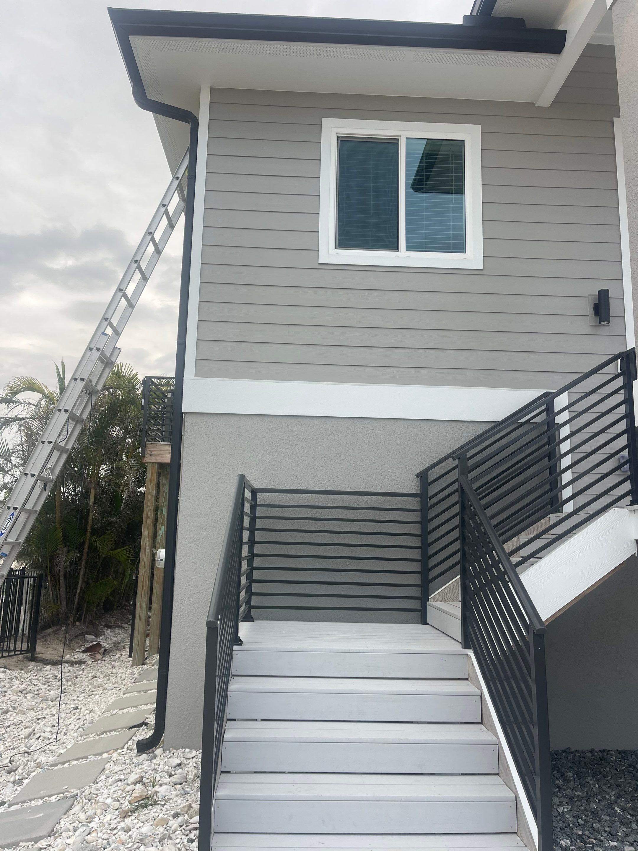 Custom Black Seamless Gutter in Fort Myers Beach FL by Gutter Professors