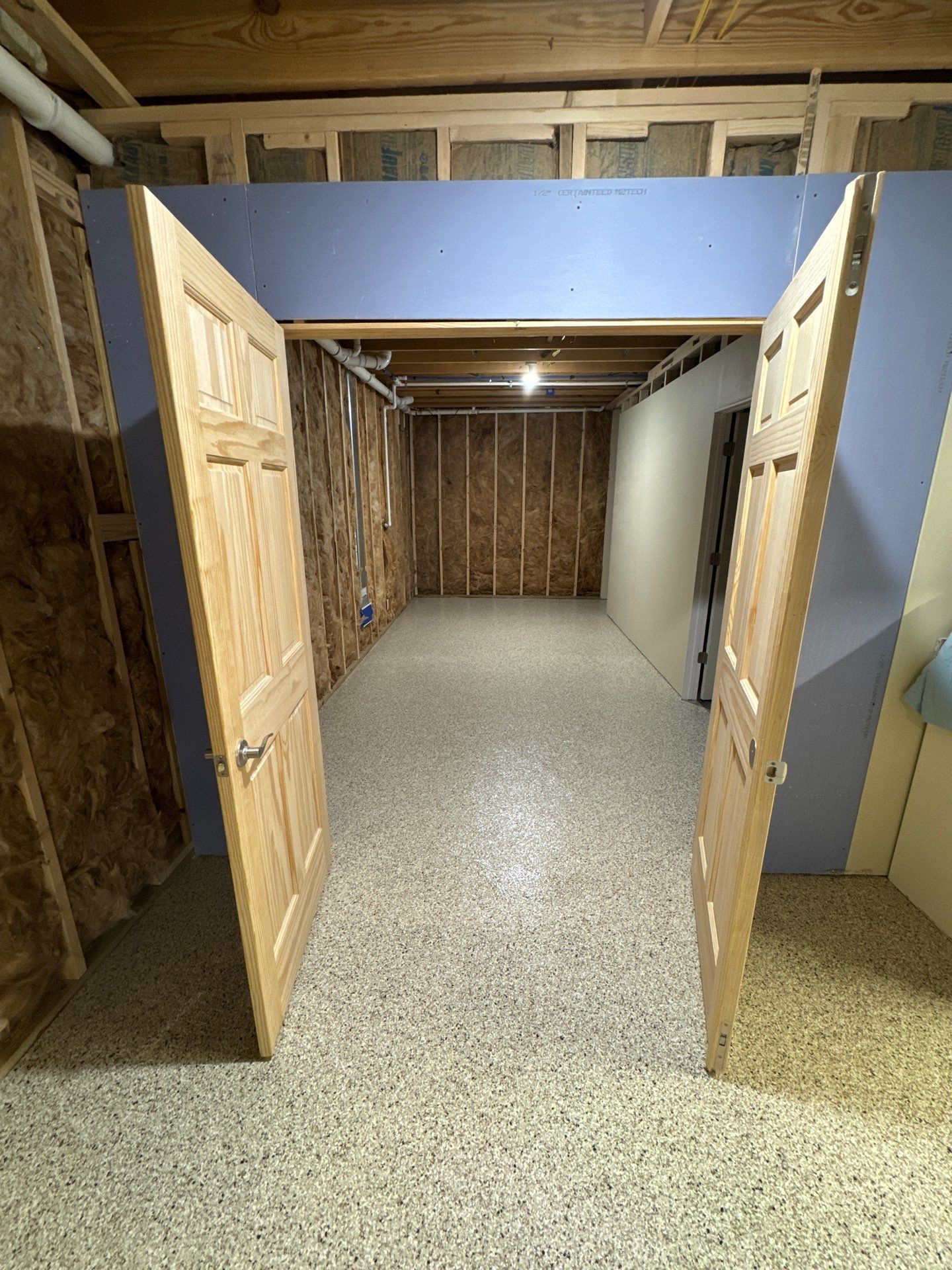Shoreline Basement Floor Coating by Level 10 Coatings