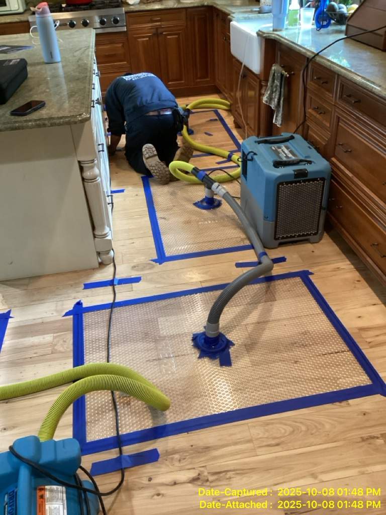 Water Damage in Kitchen by Newhouse Restoration